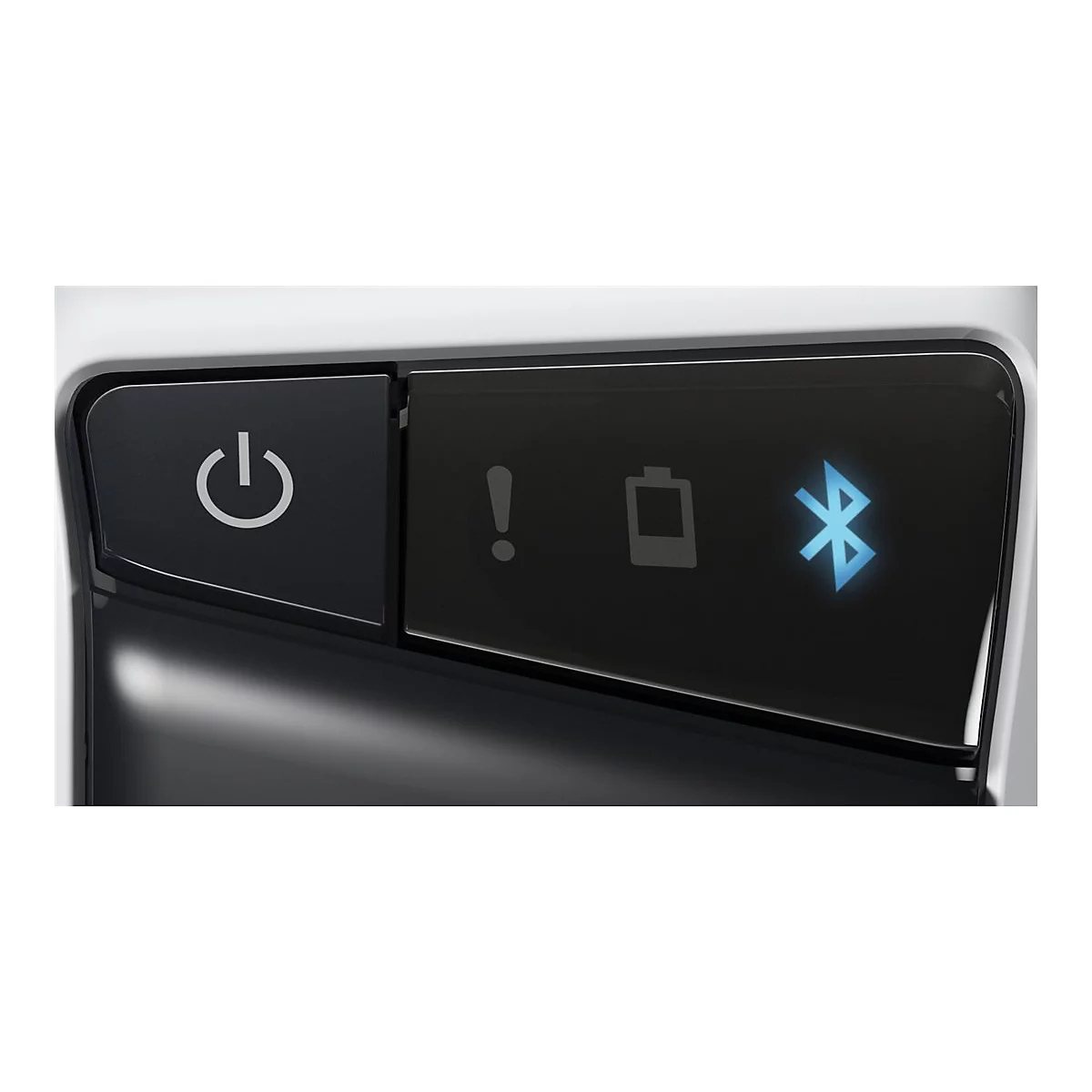 Gros plan sur une surface de panneau de contrôle noire avec bouton d'alimentation, symbole d'avertissement, symbole de batterie et symbole Bluetooth bleu.