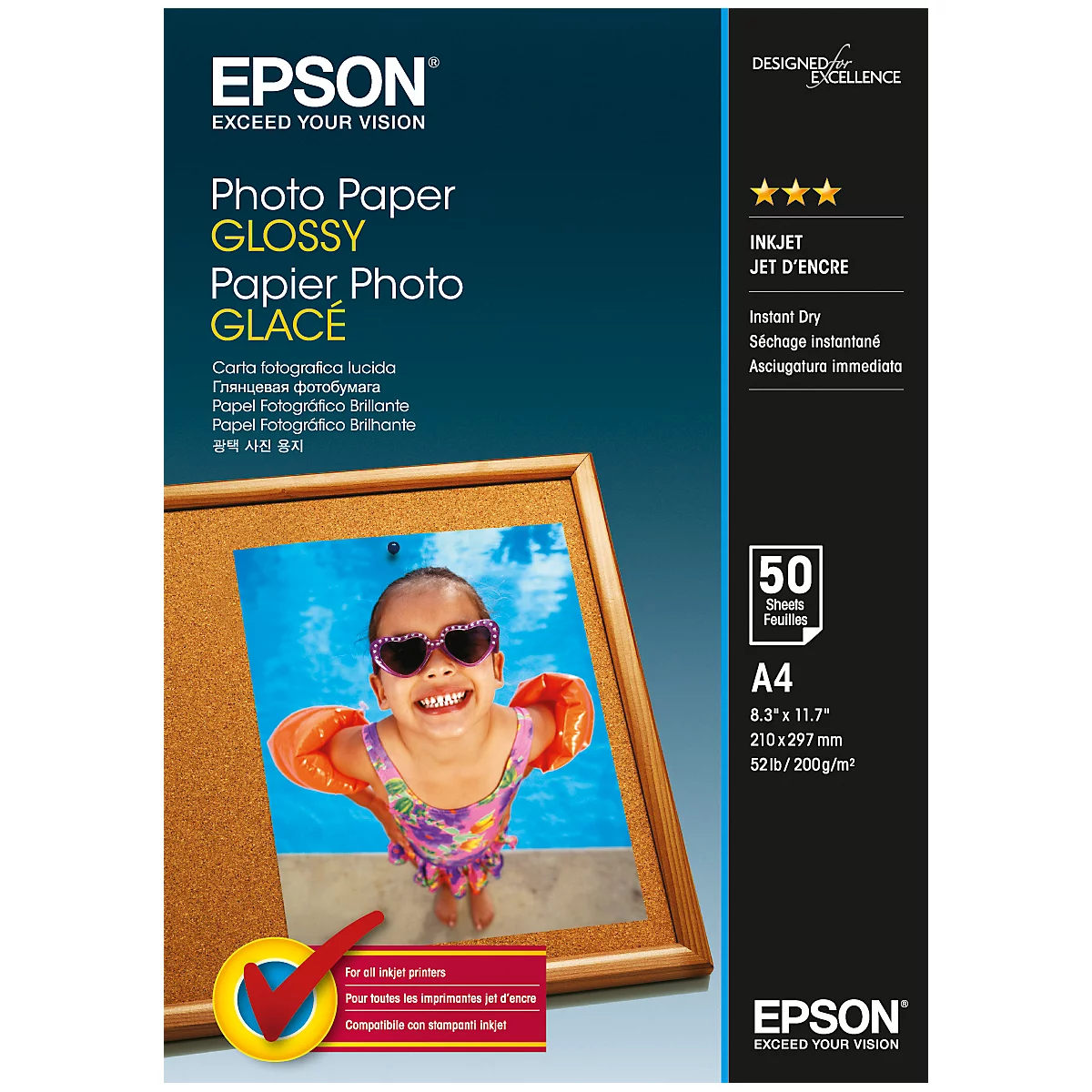 Corkboard with photo of a smiling child in a pool. Epson photo paper package, glossy surface.
