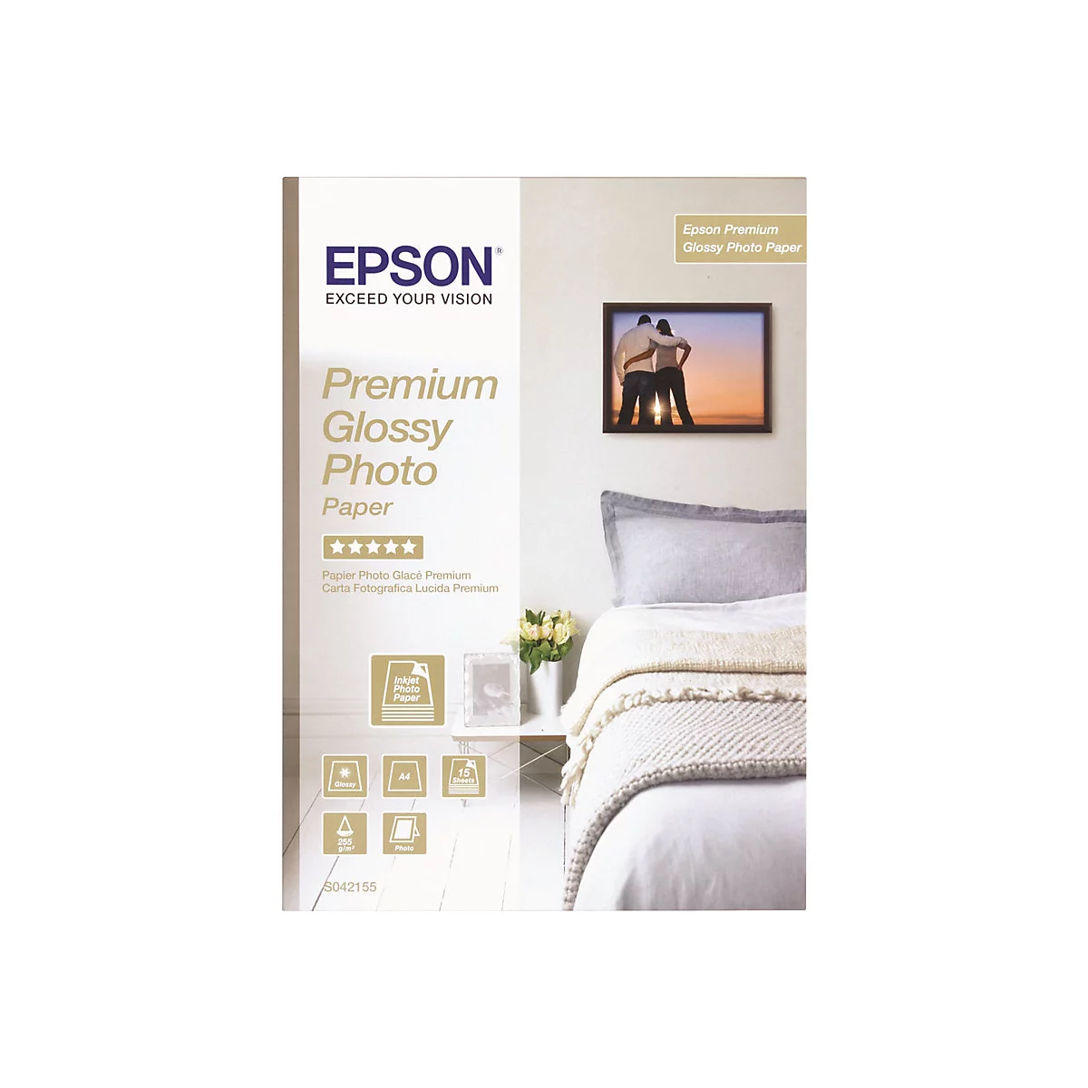 Epson Premium Glossy Fotopapier Packung mit einem eingerahmten Foto eines Paares in einem Schlafzimmer.