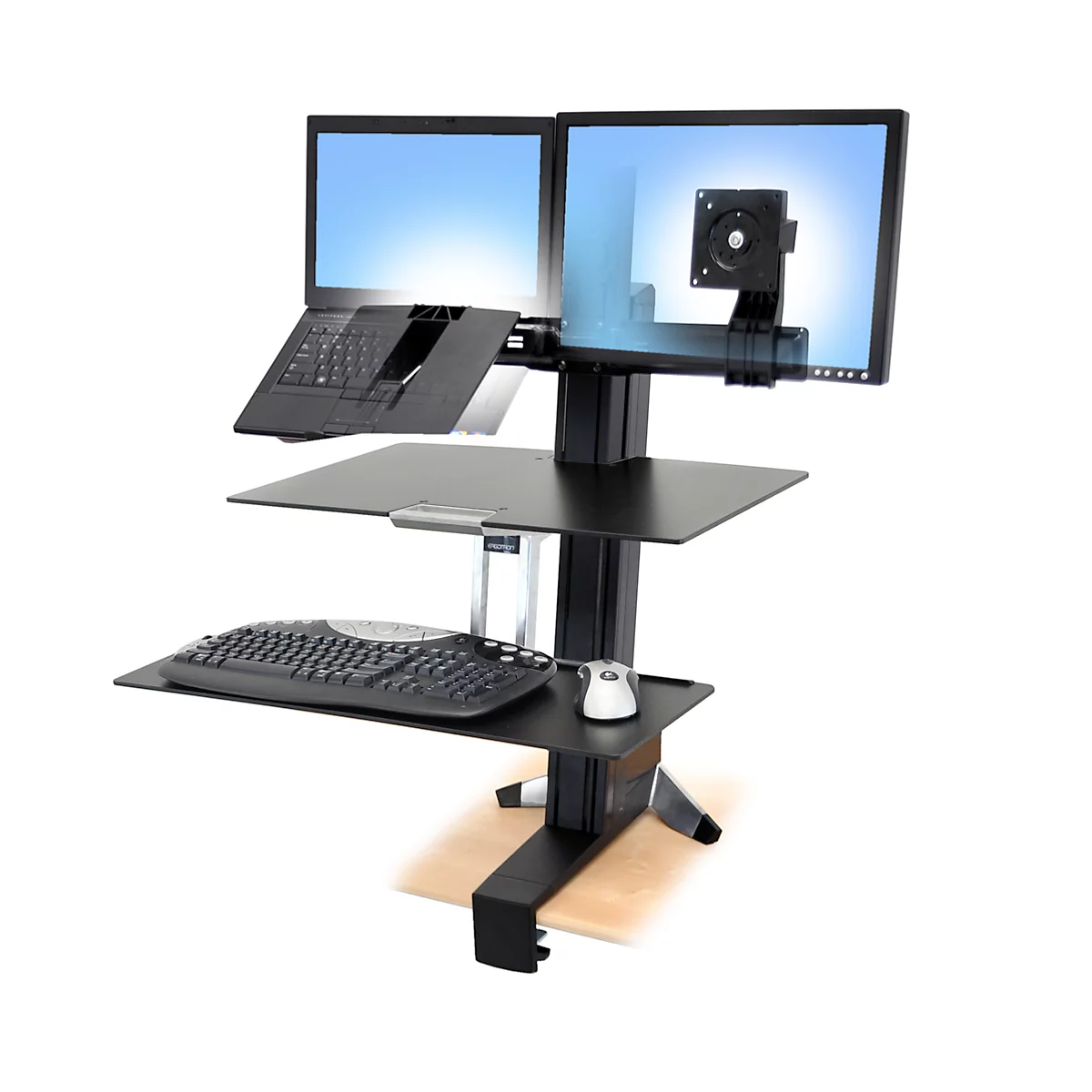 Desk with two monitors, keyboard, and mouse.