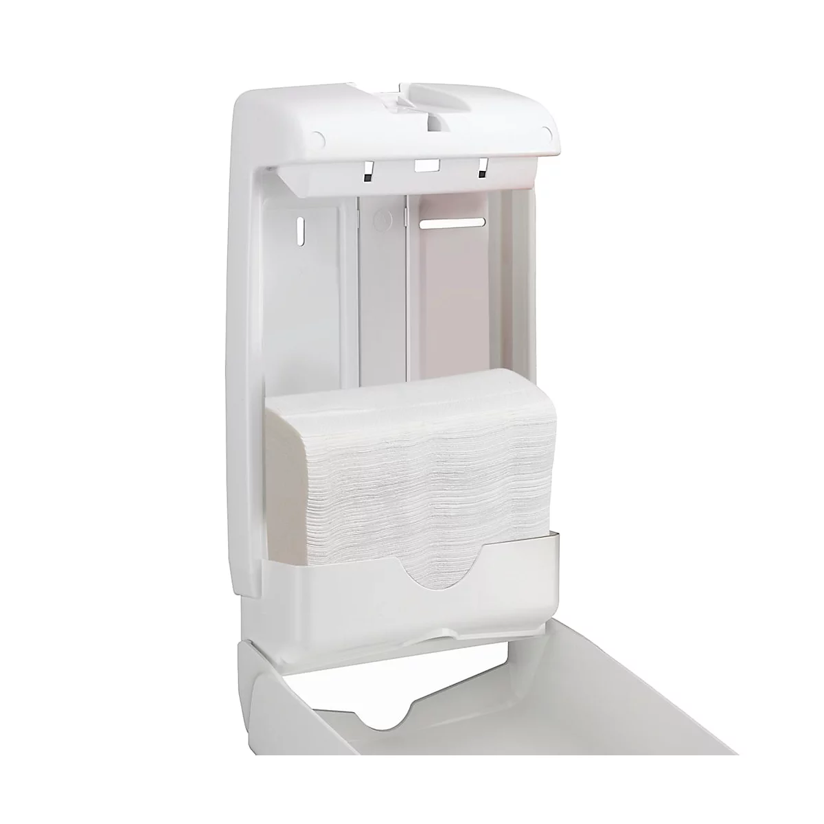 Distributeur d'essuie-mains en papier blanc avec des essuie-mains en papier pliés.