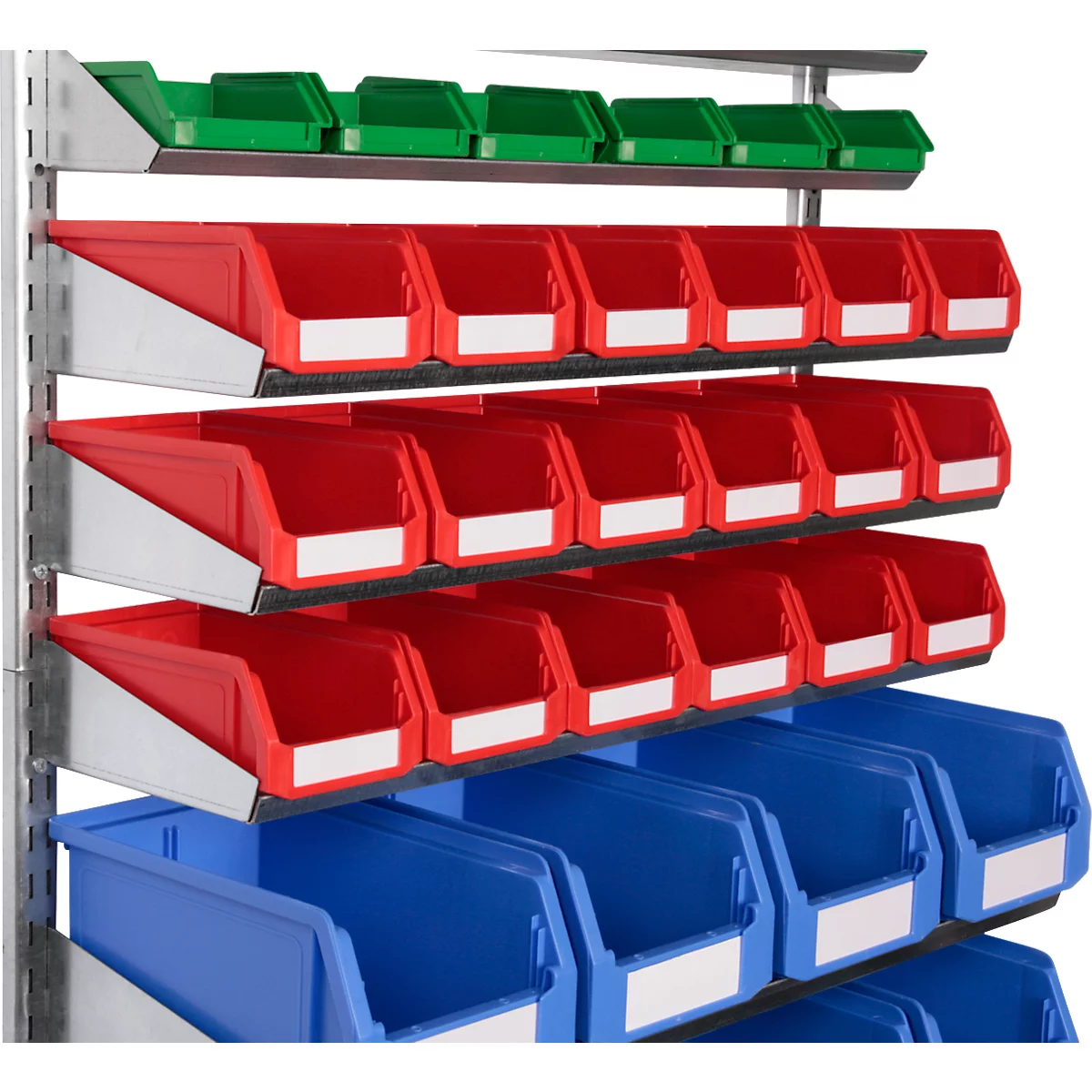 Une étagère en métal à plusieurs niveaux, remplie de nombreux bacs de stockage en plastique rouge, bleu et vert avec étiquettes.
