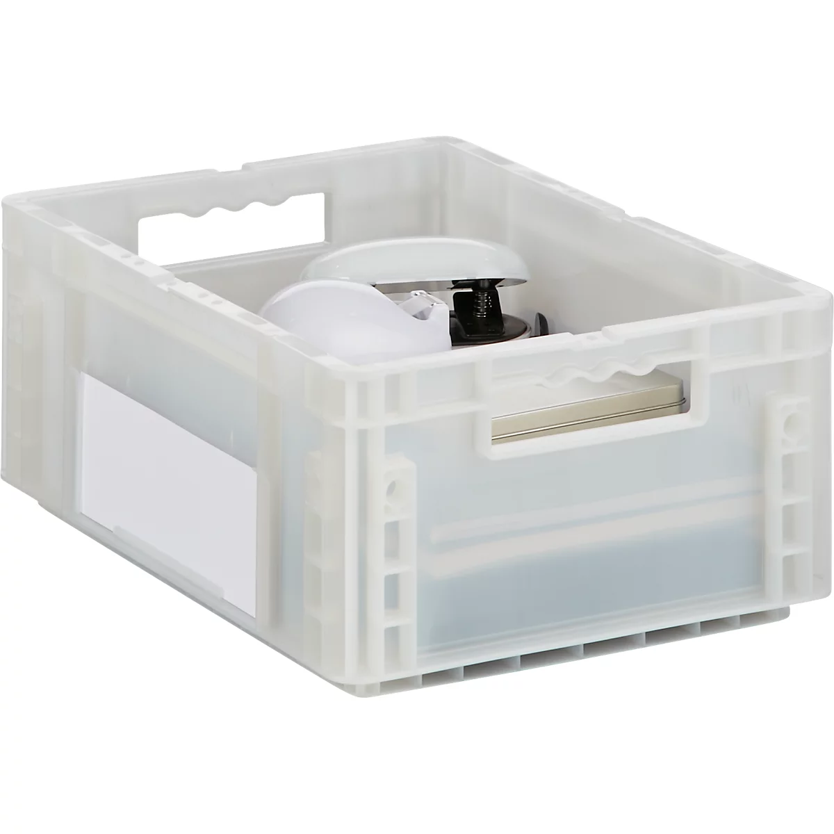 Boîte en plastique transparent avec poignées, remplie de fournitures de bureau telles qu'une agrafeuse et du papier.