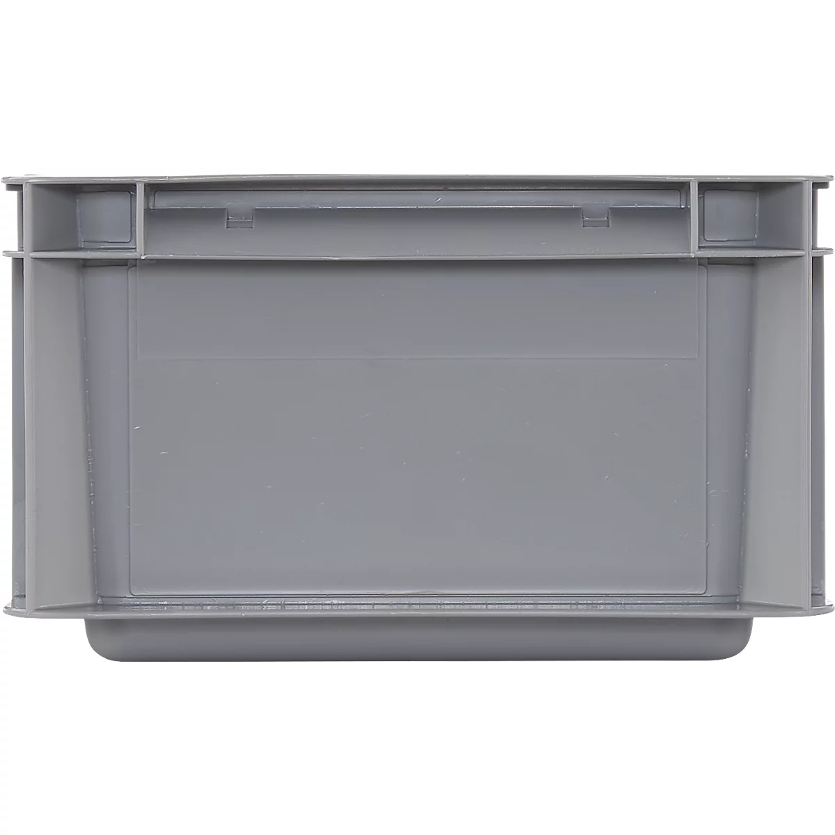 Boîte en plastique grise, vue de dessus. Forme angulaire, côtés surélevés, petite bordure.