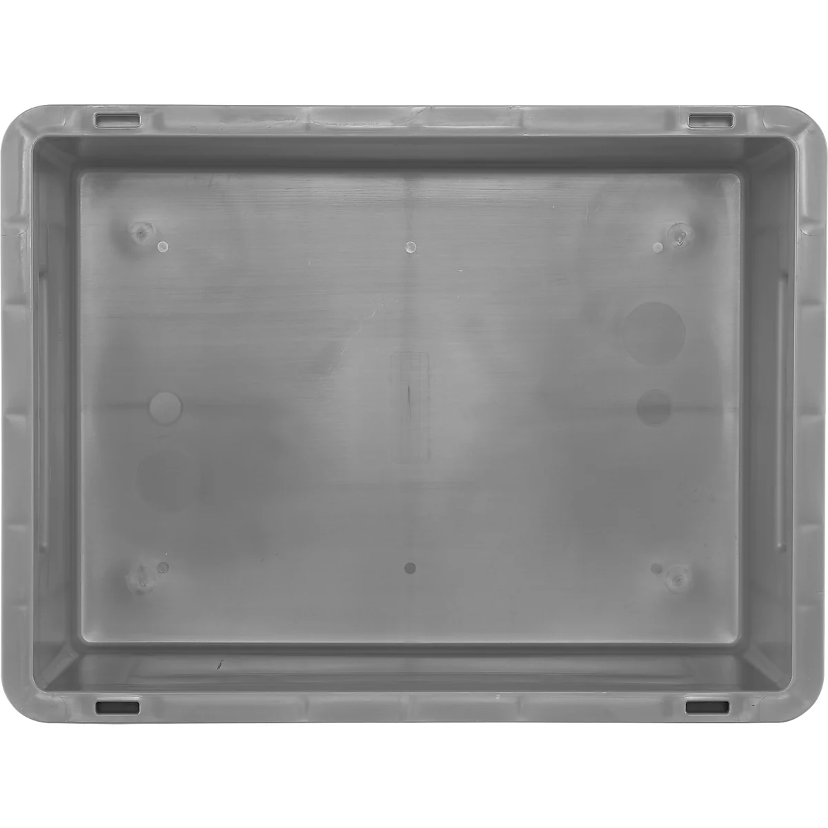 Boîte en plastique grise et rectangulaire, vue de dessus.