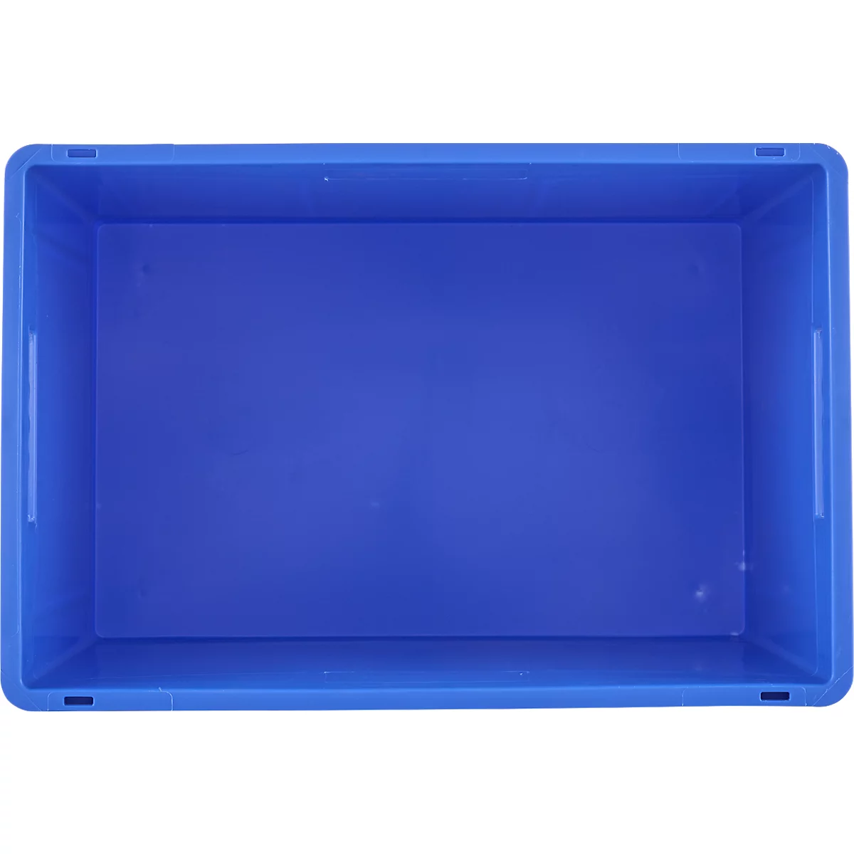 Boîte en plastique bleue, photographiée d'en haut. La boîte a une forme rectangulaire, avec une poignée des deux côtés.