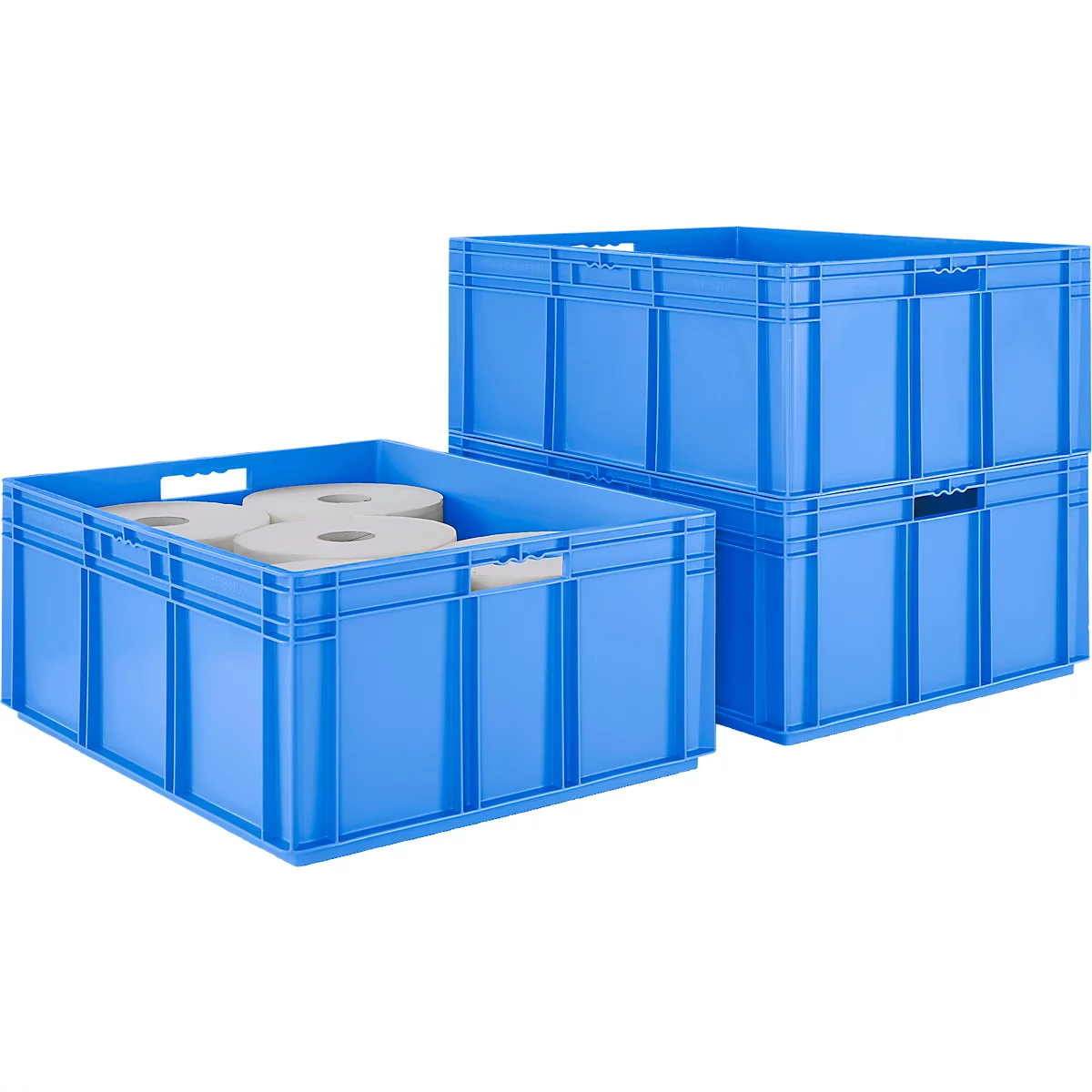Des bacs en plastique bleus, dont un rempli de rouleaux de papier, sont côte à côte.