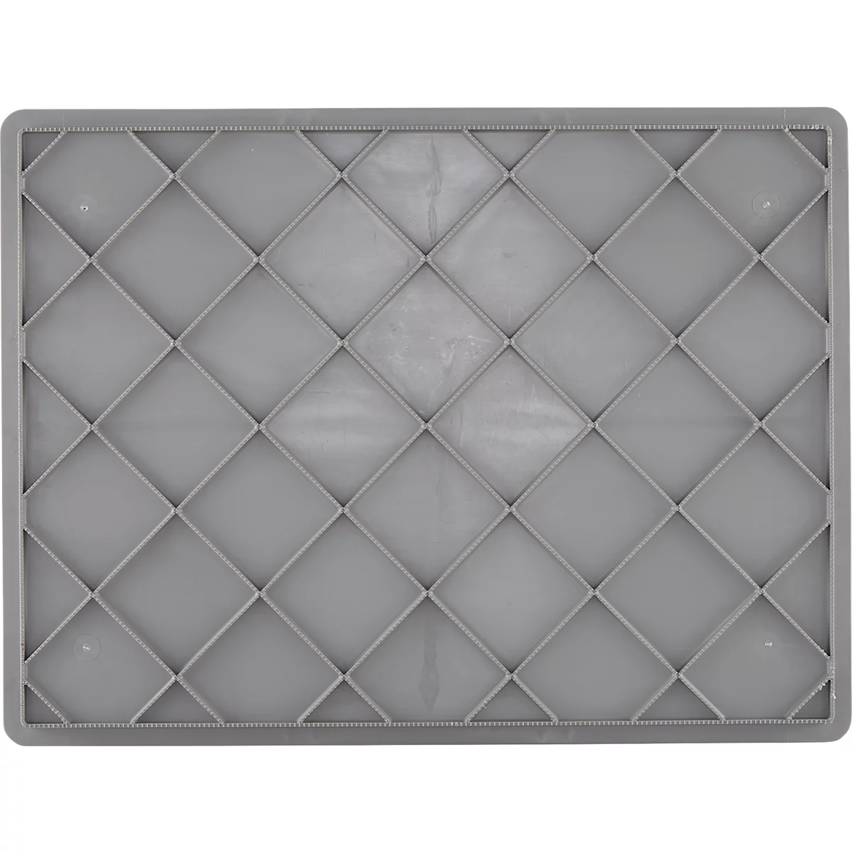 Vue de dessus d'une boîte en plastique grise avec un motif en losanges.