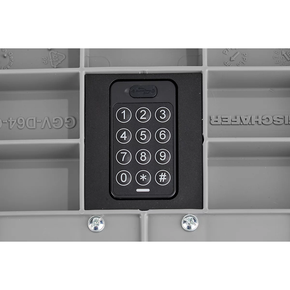 Close-up van een zwart numeriek toetsenbord met witte cijfers. Het is in een grijs kader geplaatst, omgeven door grijs plastic.