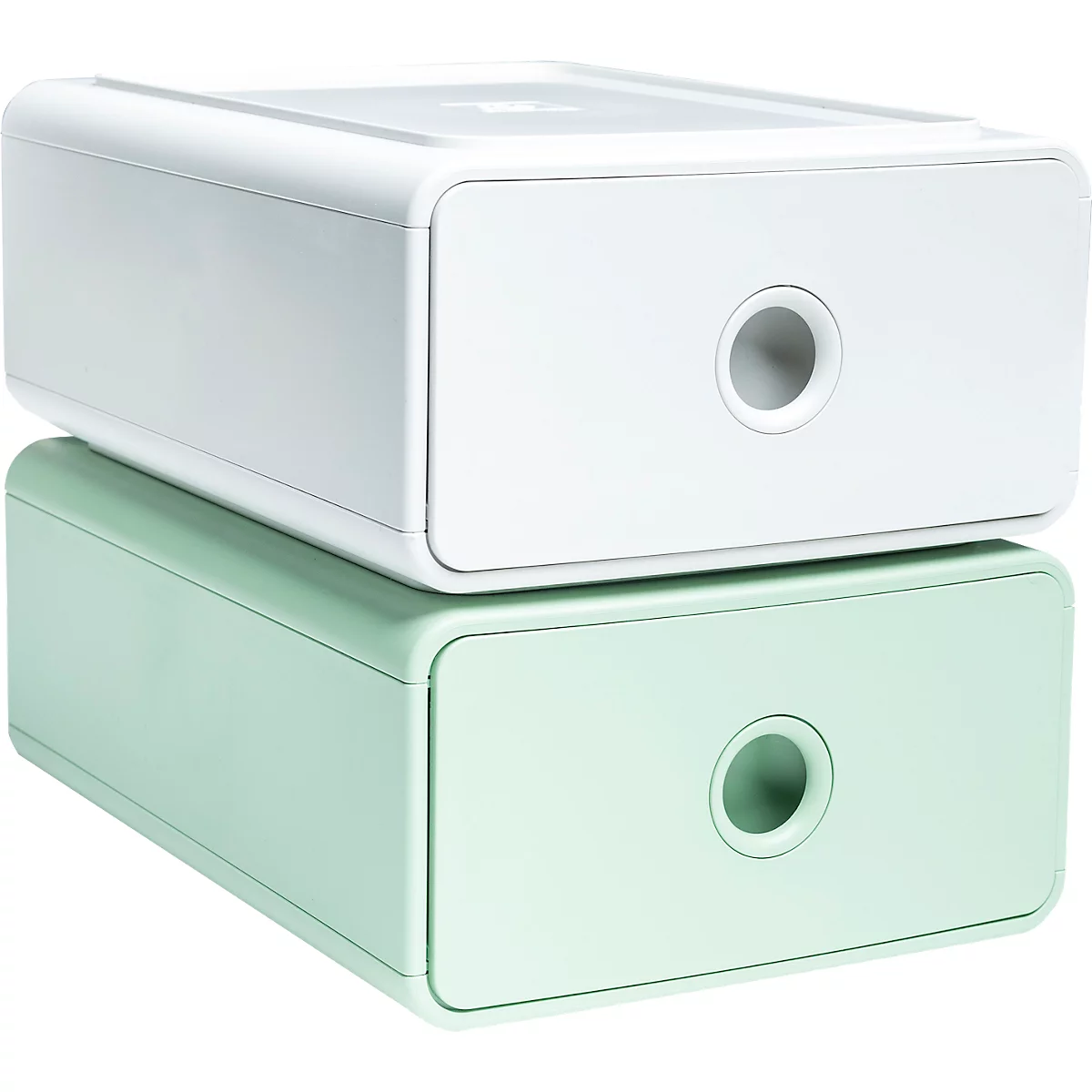 Deux tiroirs empilables en blanc et vert menthe. Chaque tiroir a une ouverture ronde.