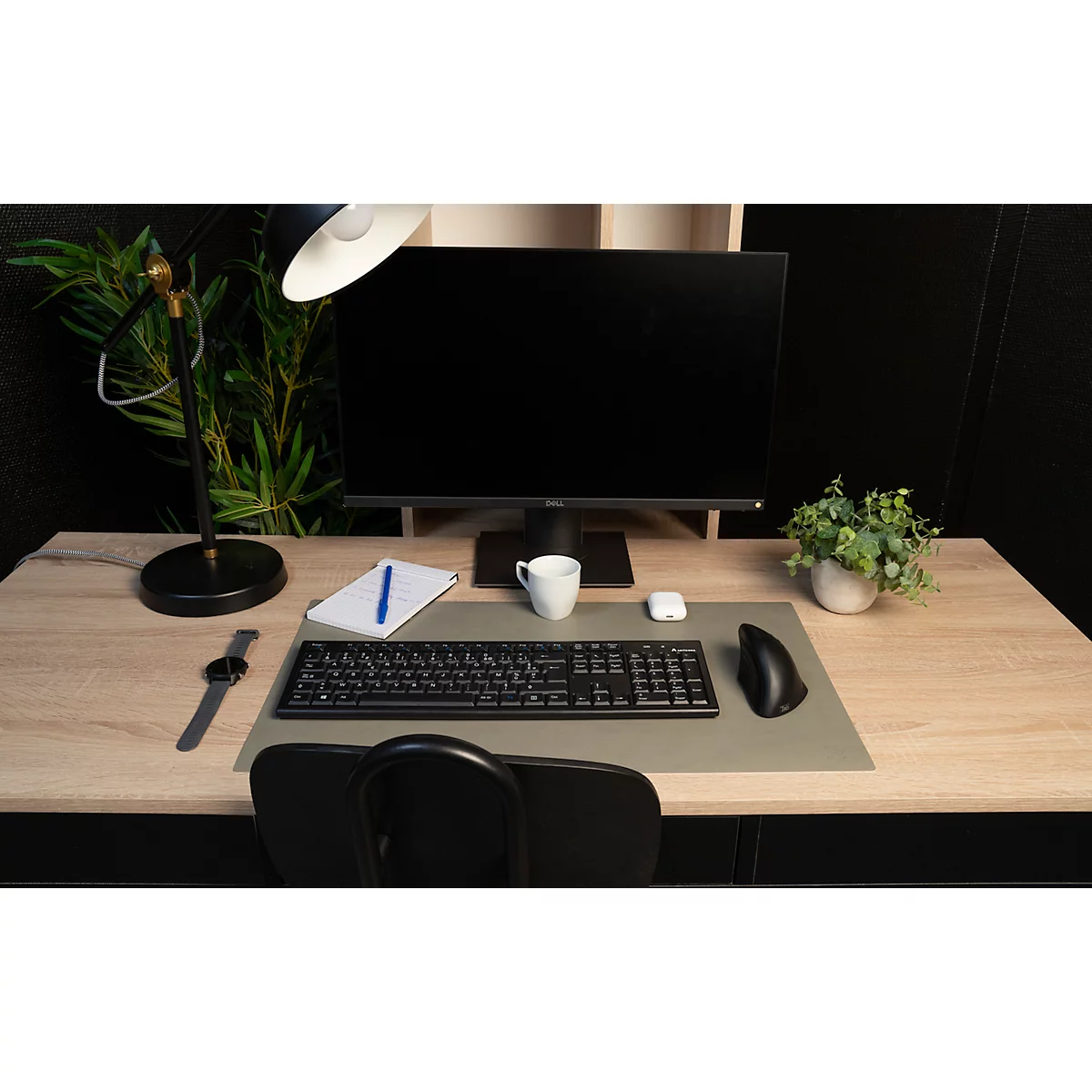 Grijze cameracontour op een witte achtergrond.