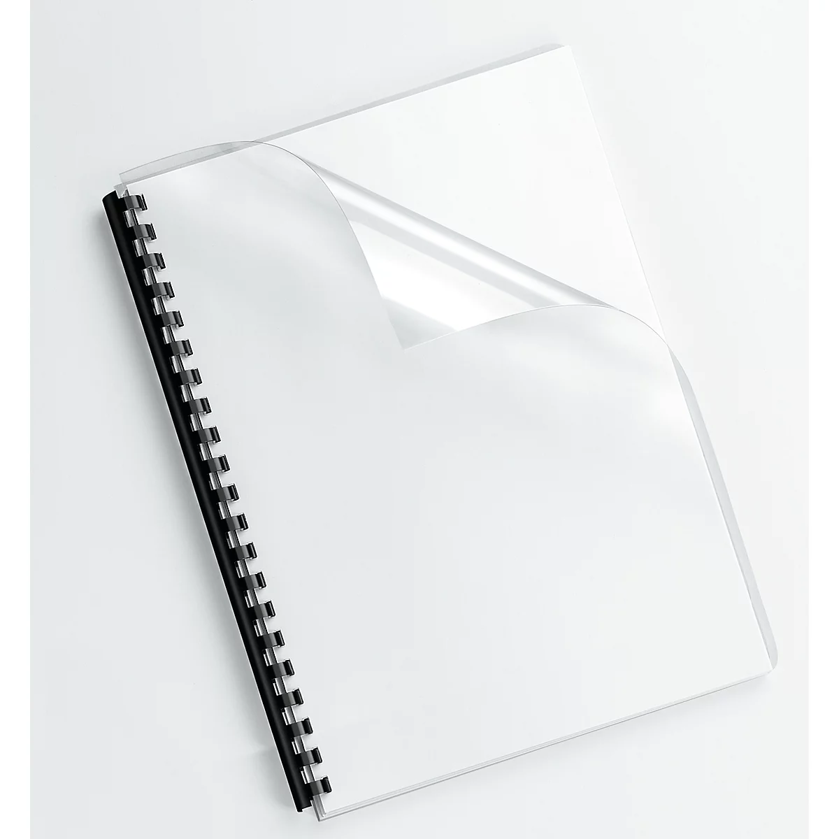 A white notebook with a black spiral binding, the cover sheets are partially unfolded.