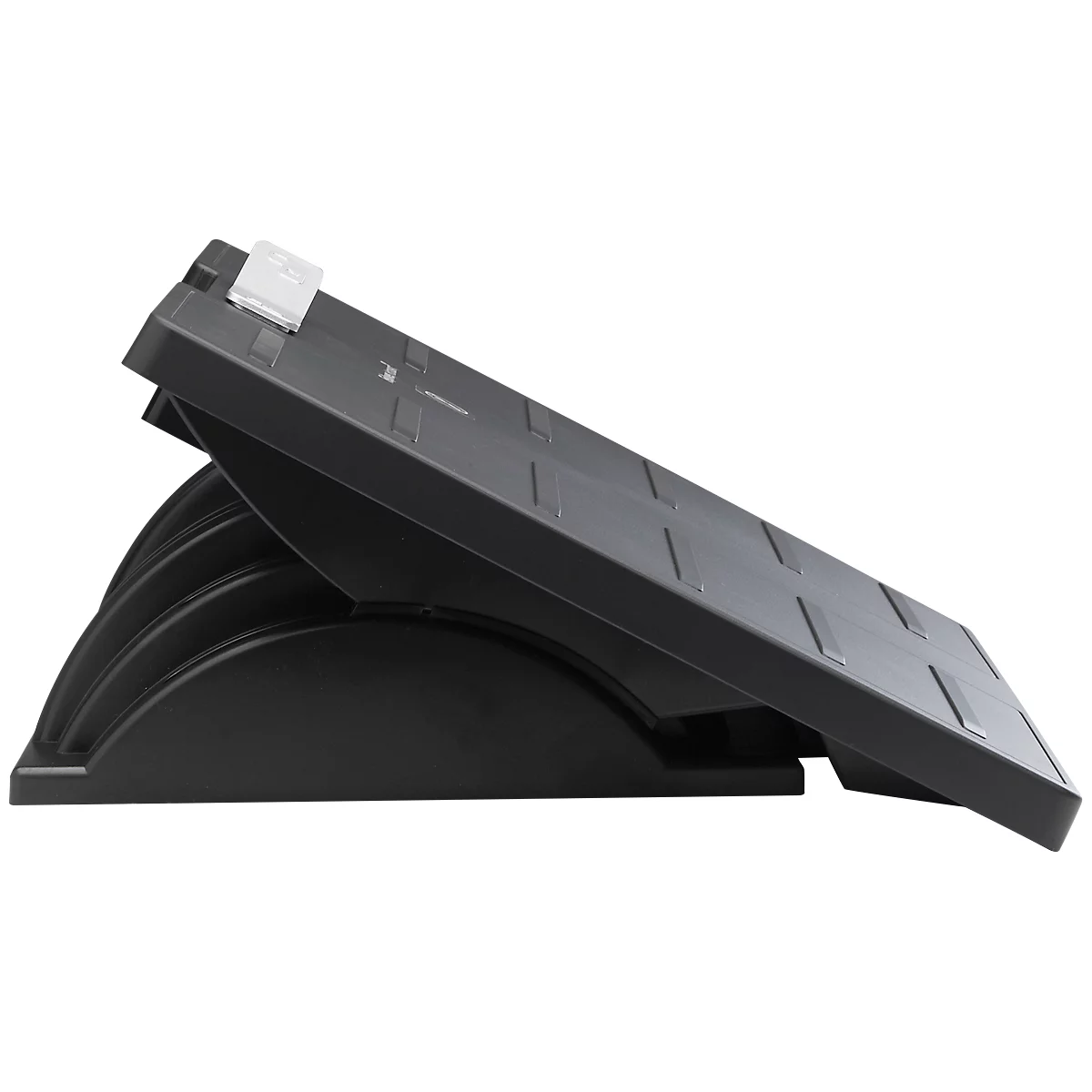 Black footrest angled with ribbed surface. Side view.