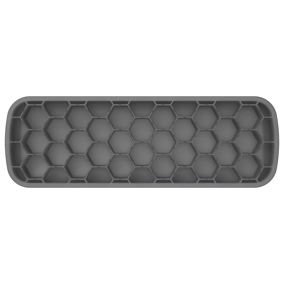 Personne tapant sur un clavier blanc. Repose-poignet, souris et tapis de souris sur un bureau en bois.