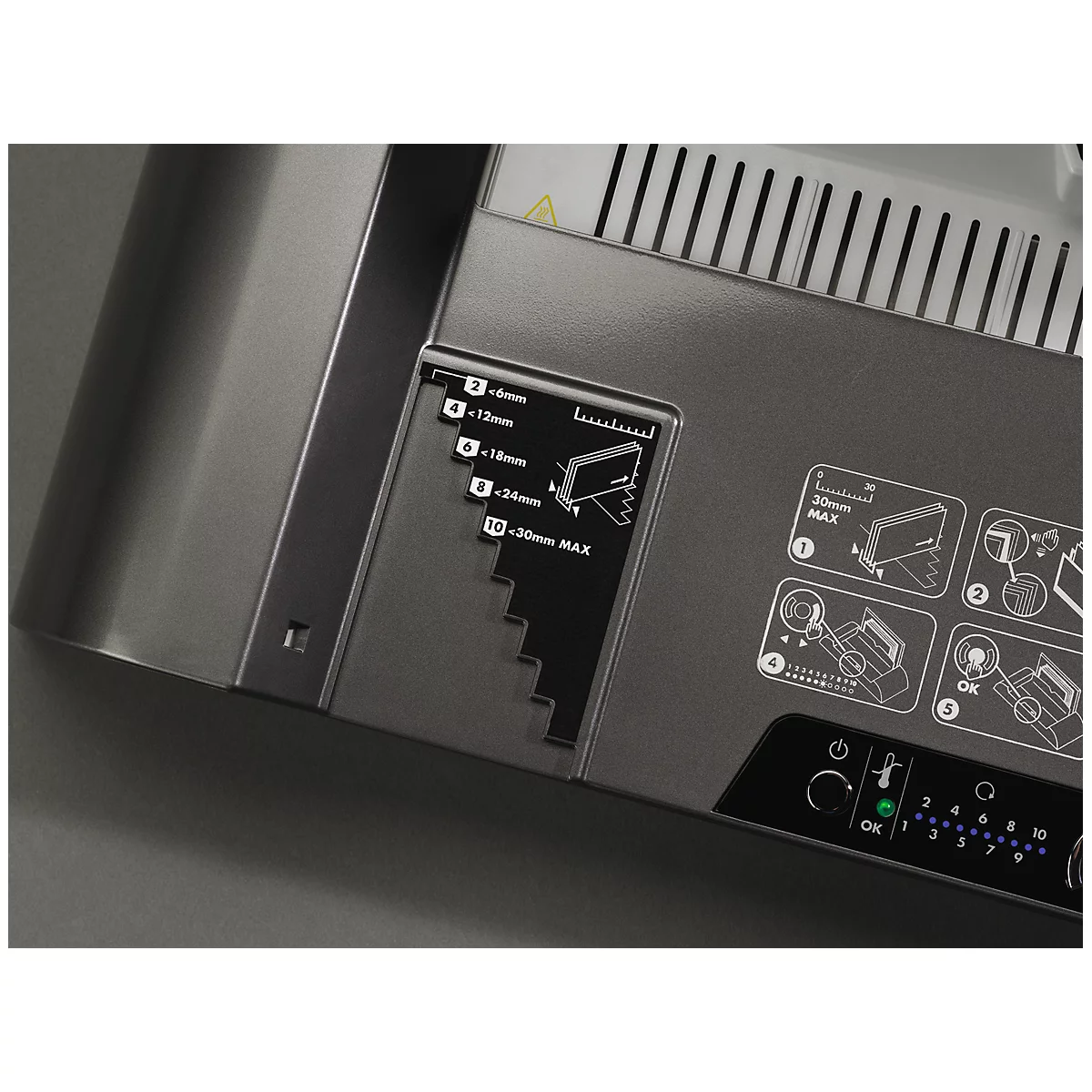 Detailed view of the labeling on a metallic laminator.