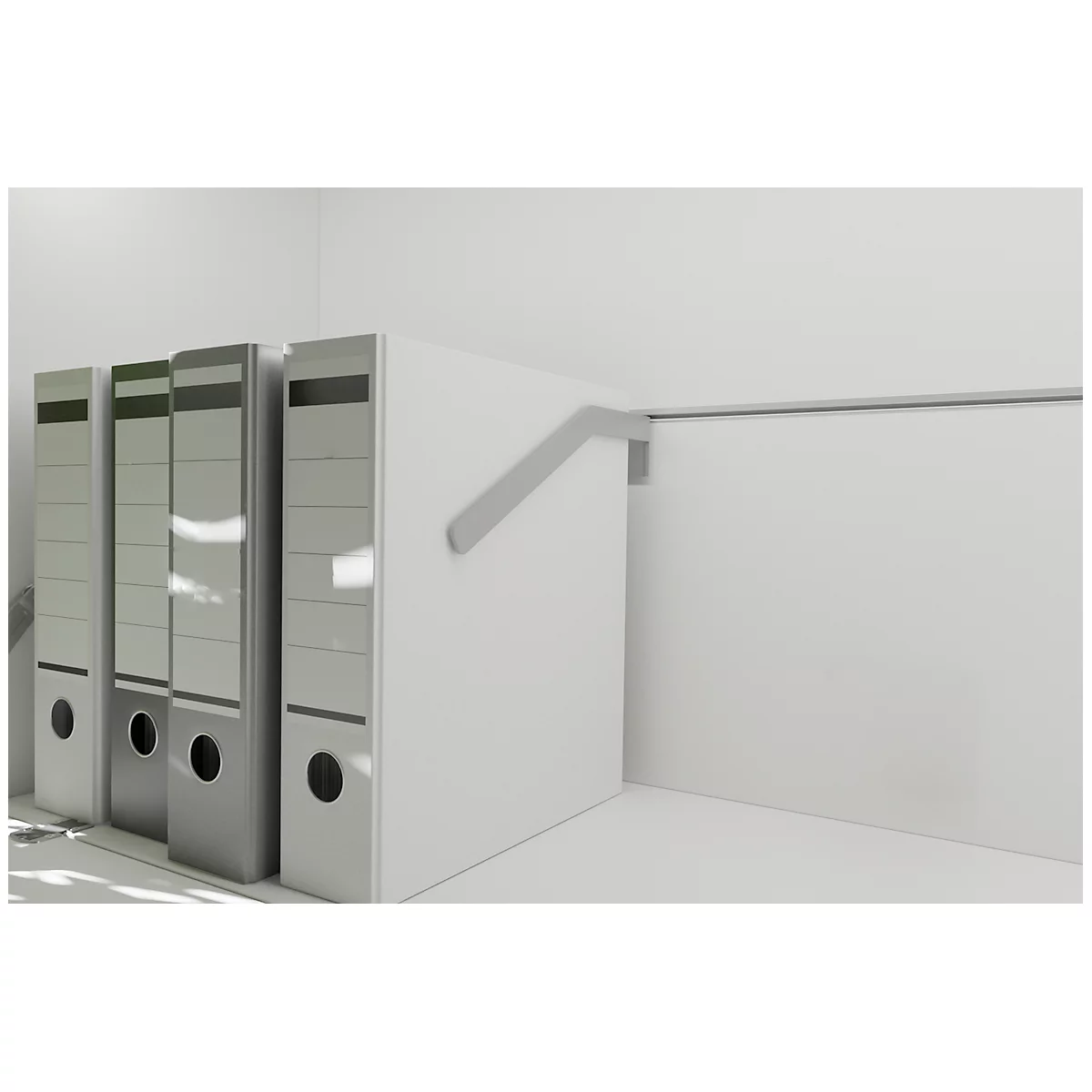 Three gray folders stand in a corner. A gray bracket is attached to the wall on a white surface.