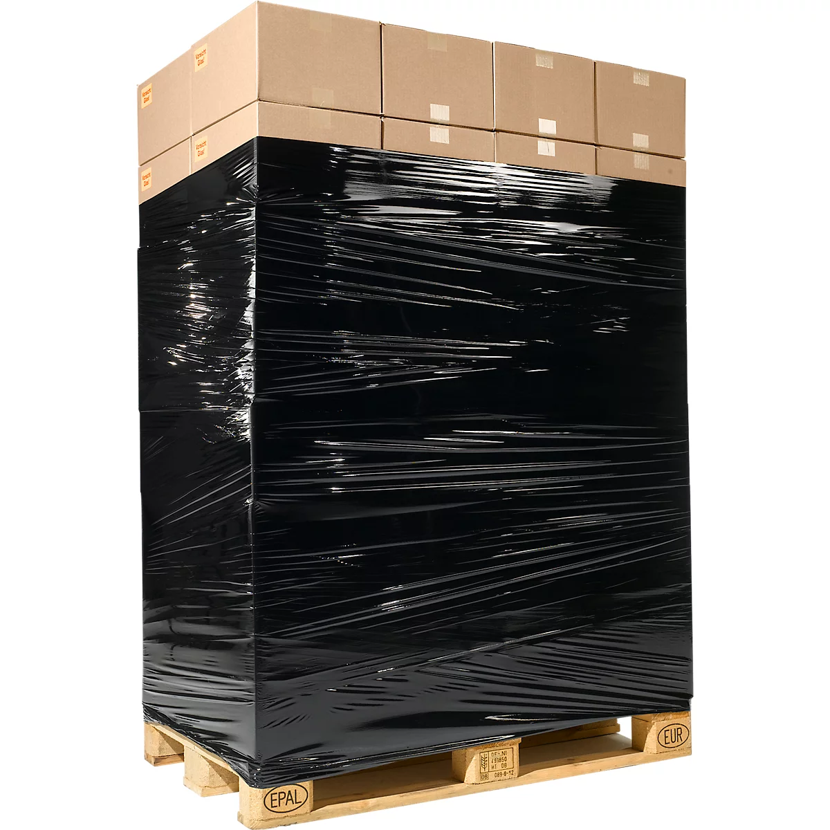 Una pila de cajas envueltas en papel de aluminio negro sobre una paleta. En la parte superior se ven cajas de cartón.