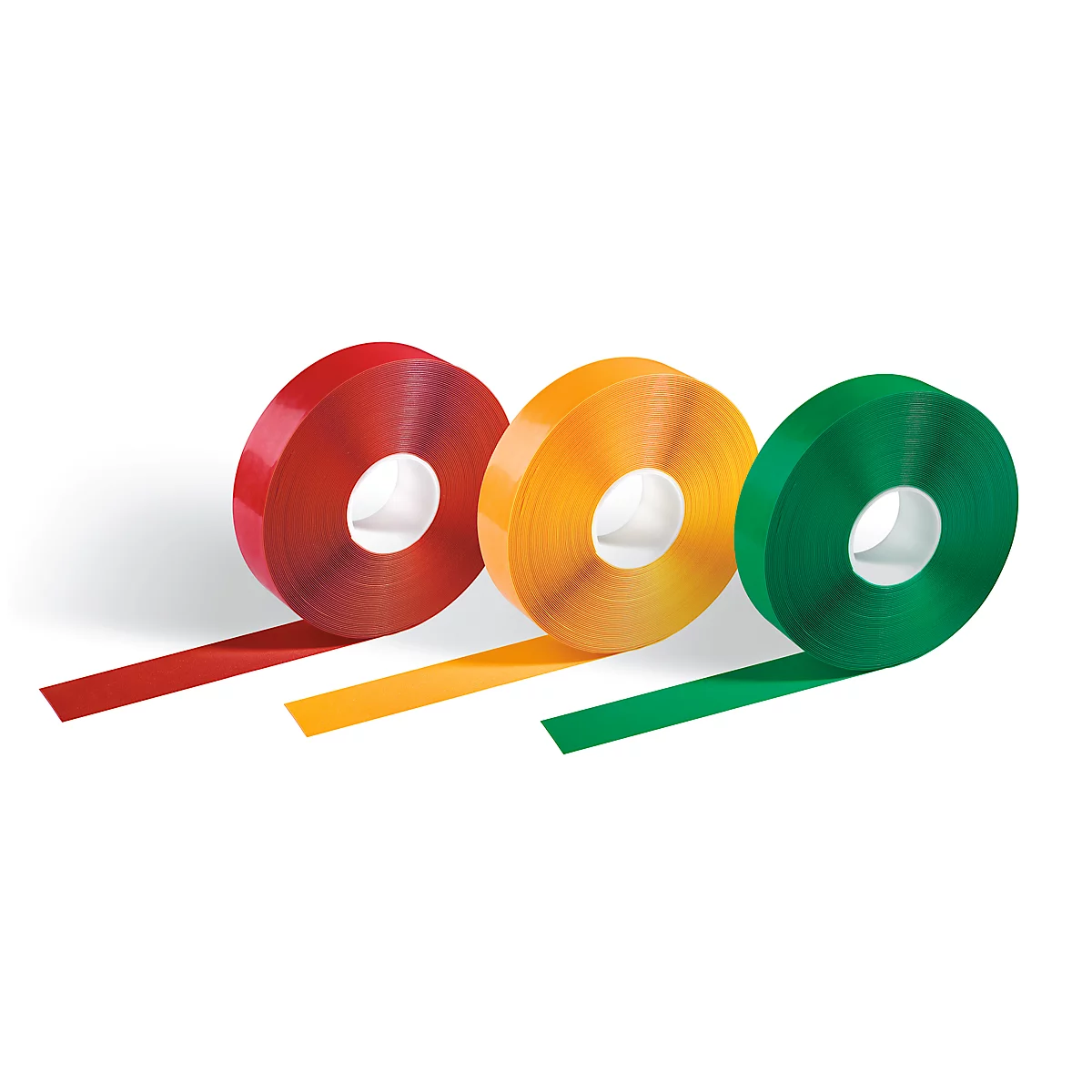 Three rolls of colored tape, red, yellow and green, on a white background.