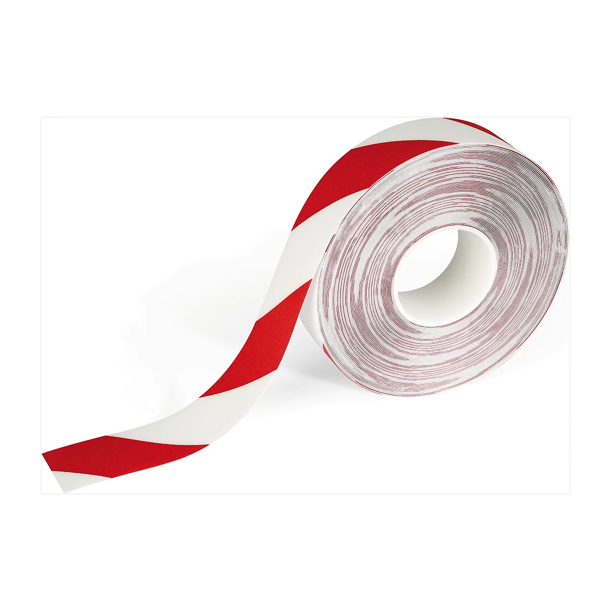 A roll of red and white striped warning tape. The tape is coming off and lies in front of the roll core.