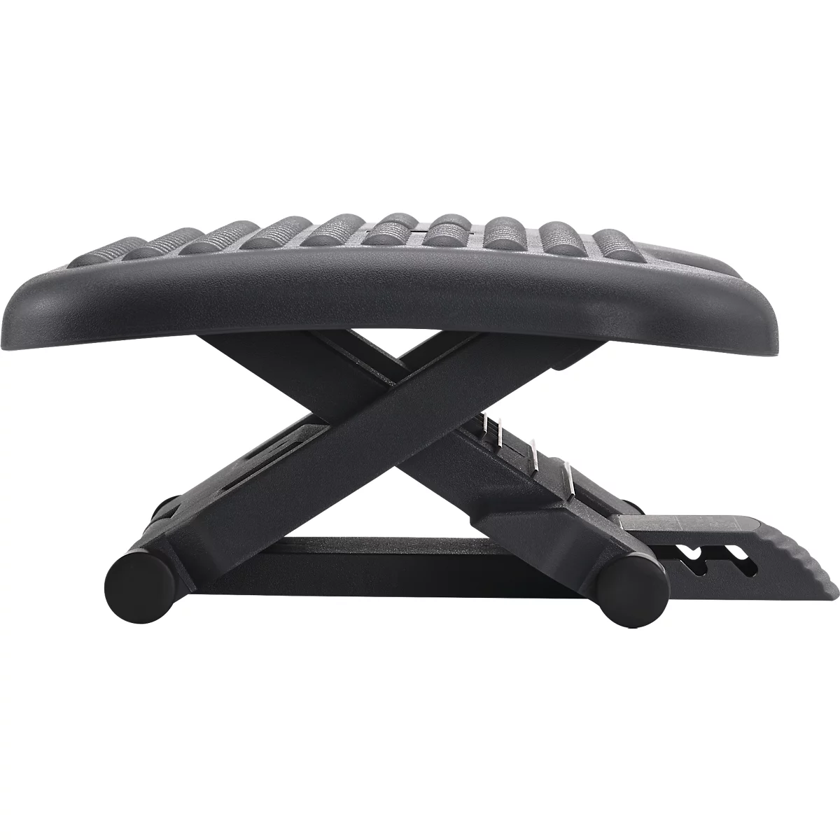 Black footrest, seen from the side. Top with knobs, scissor frame. Two wheels below.