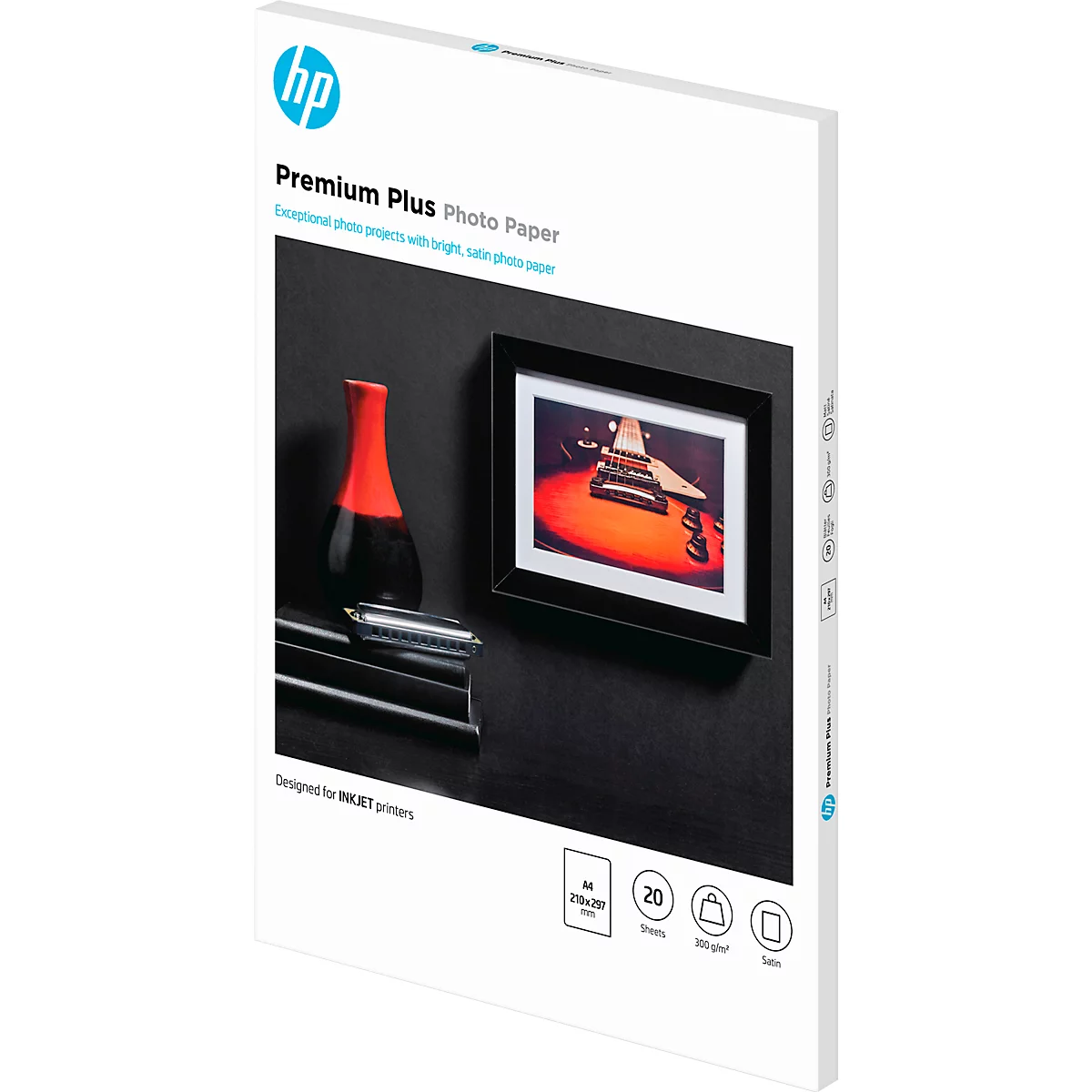 Productverpakking HP Premium Plus fotopapier met een ingelijste foto van een gitaar.