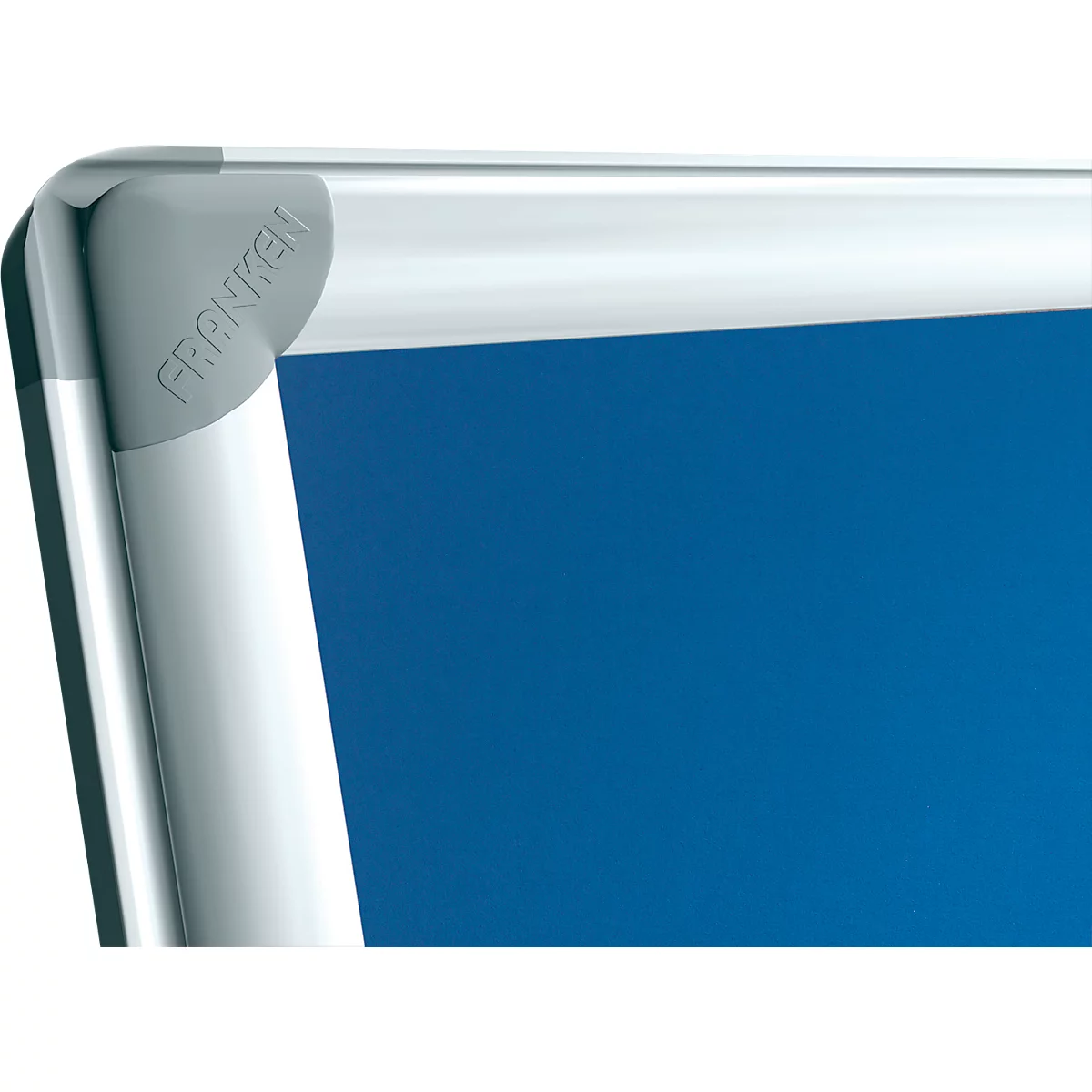 Close-up of a corner of a whiteboard. Silver frame with blue background, gray corner piece with "FRANKEN" lettering.