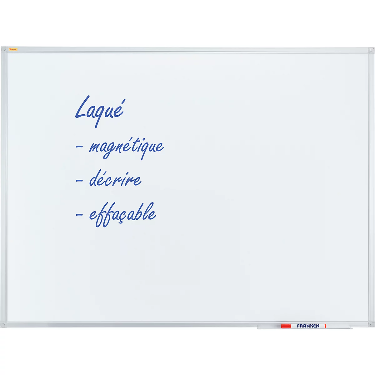 White whiteboard with blue text: Laqué, magnétique, décrire, effaçable. A red and white pen at the bottom.