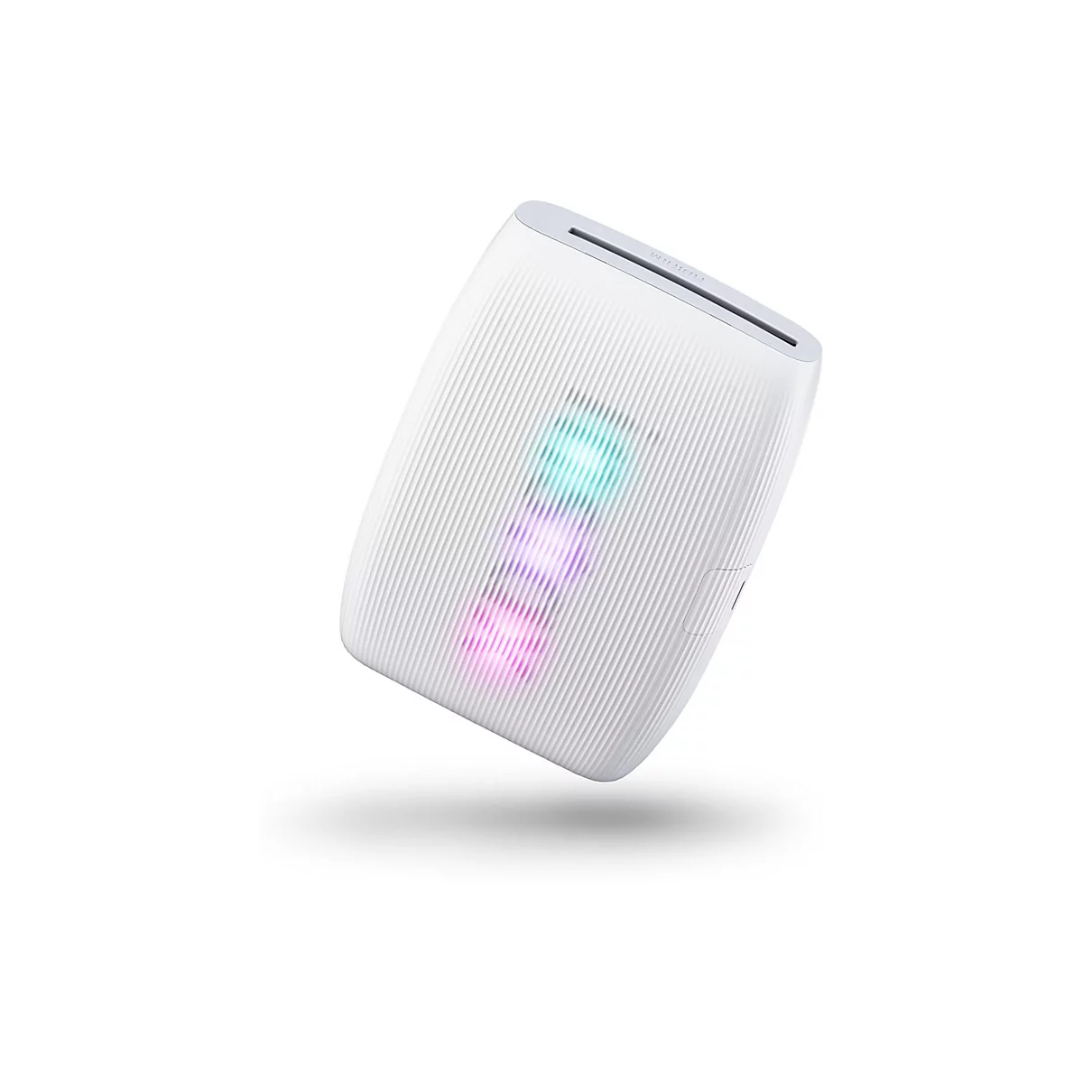 Appareil blanc, oblong, avec une surface nervurée et l'inscription 'TAILOX'. Un petit renfoncement sur le côté.