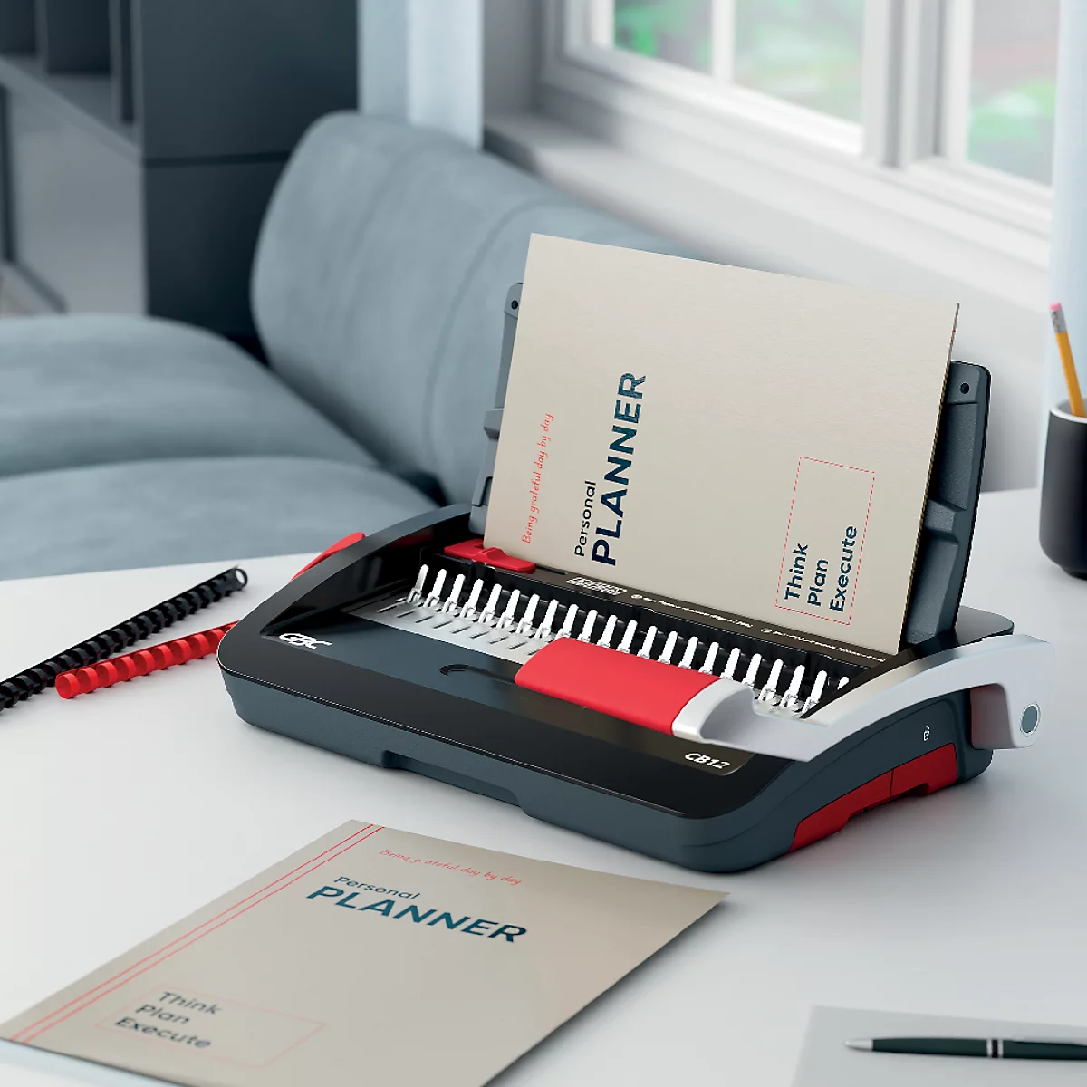 Ein Bindegerät mit einem "Personal PLANNER"-Dokument.