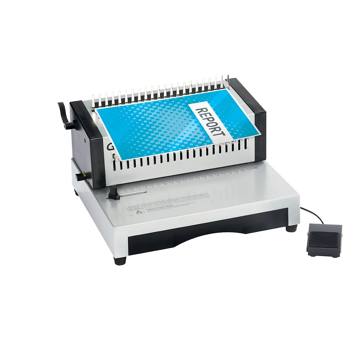 Machine à relier avec feuille insérée indiquant "REPORT". Boîtier gris, interrupteur à pédale.