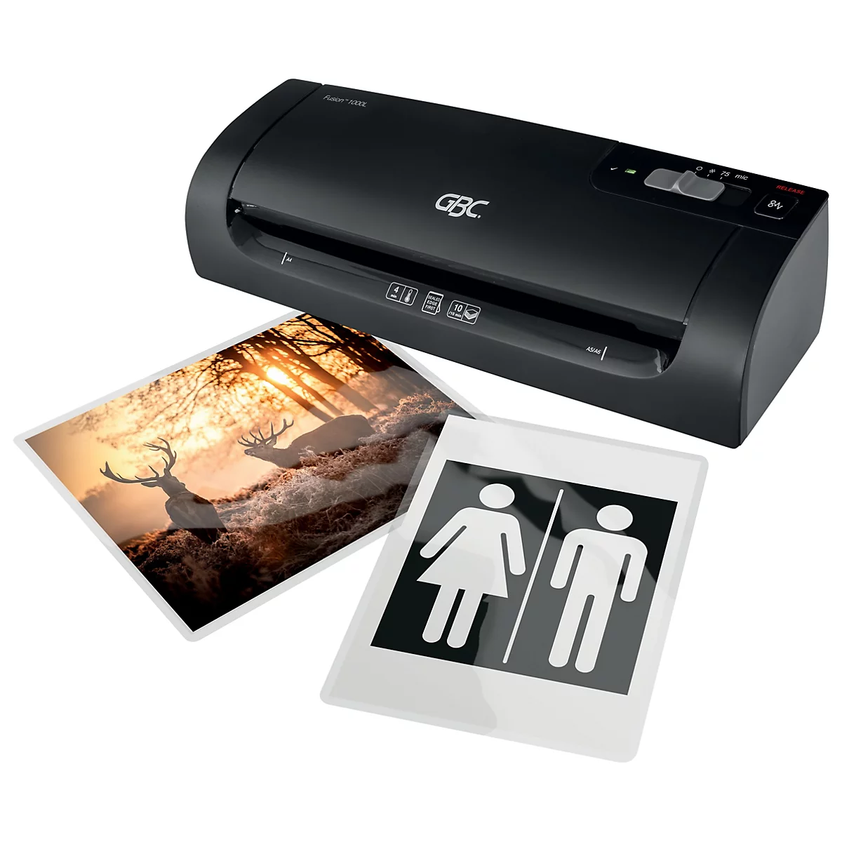 Schwarzes Laminiergerät mit zwei laminierten Bildern: ein Waldlandschaft und ein Toilettenschild.