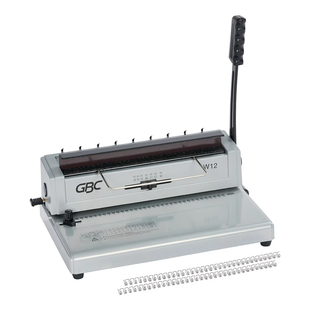 Machine à relier GBC W12 grise avec poignée et spirales. Des trous sont sur le dessus, un plateau en dessous.