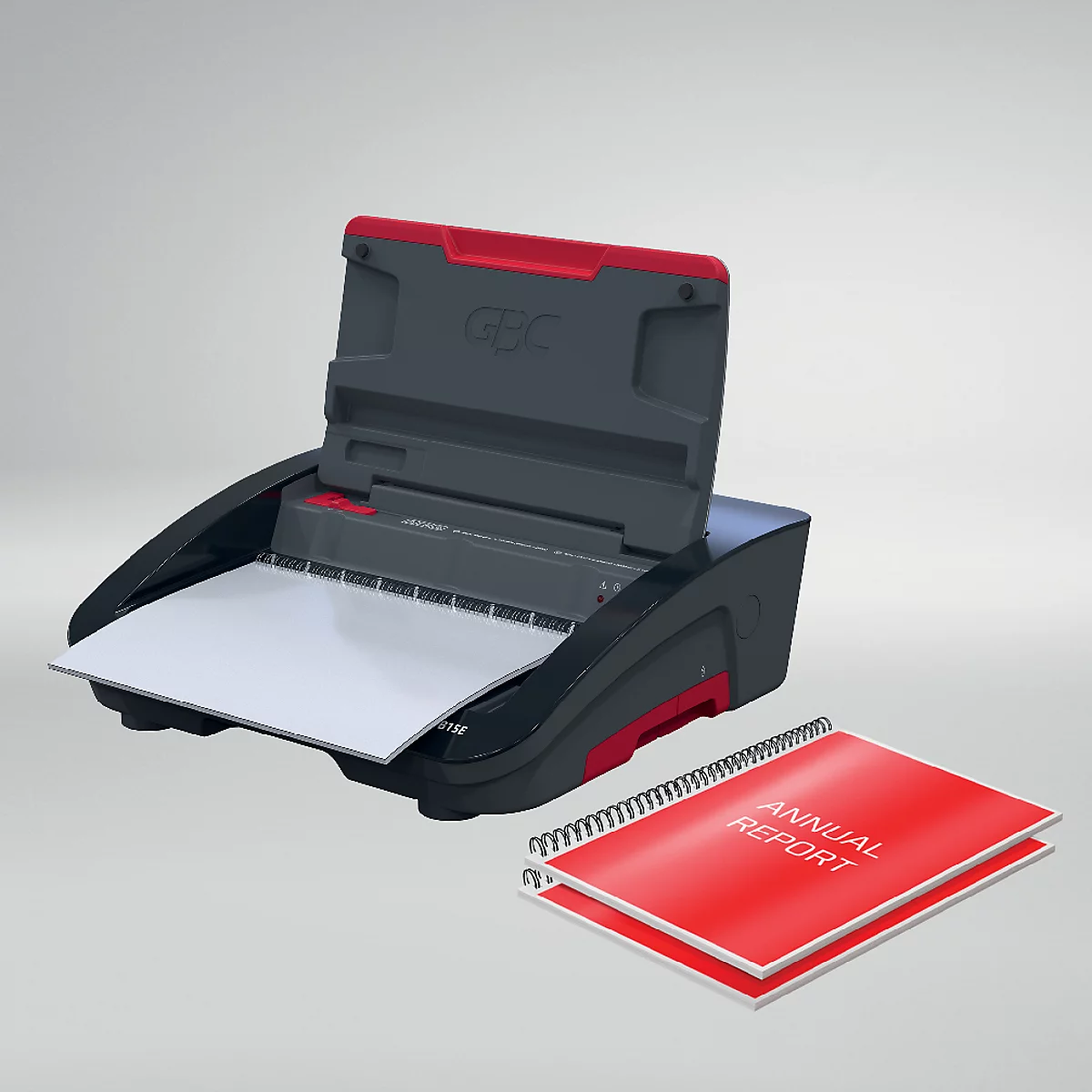 Une relieuse GBC noire et rouge avec le couvercle ouvert, une feuille de papier et un rapport annuel rouge.