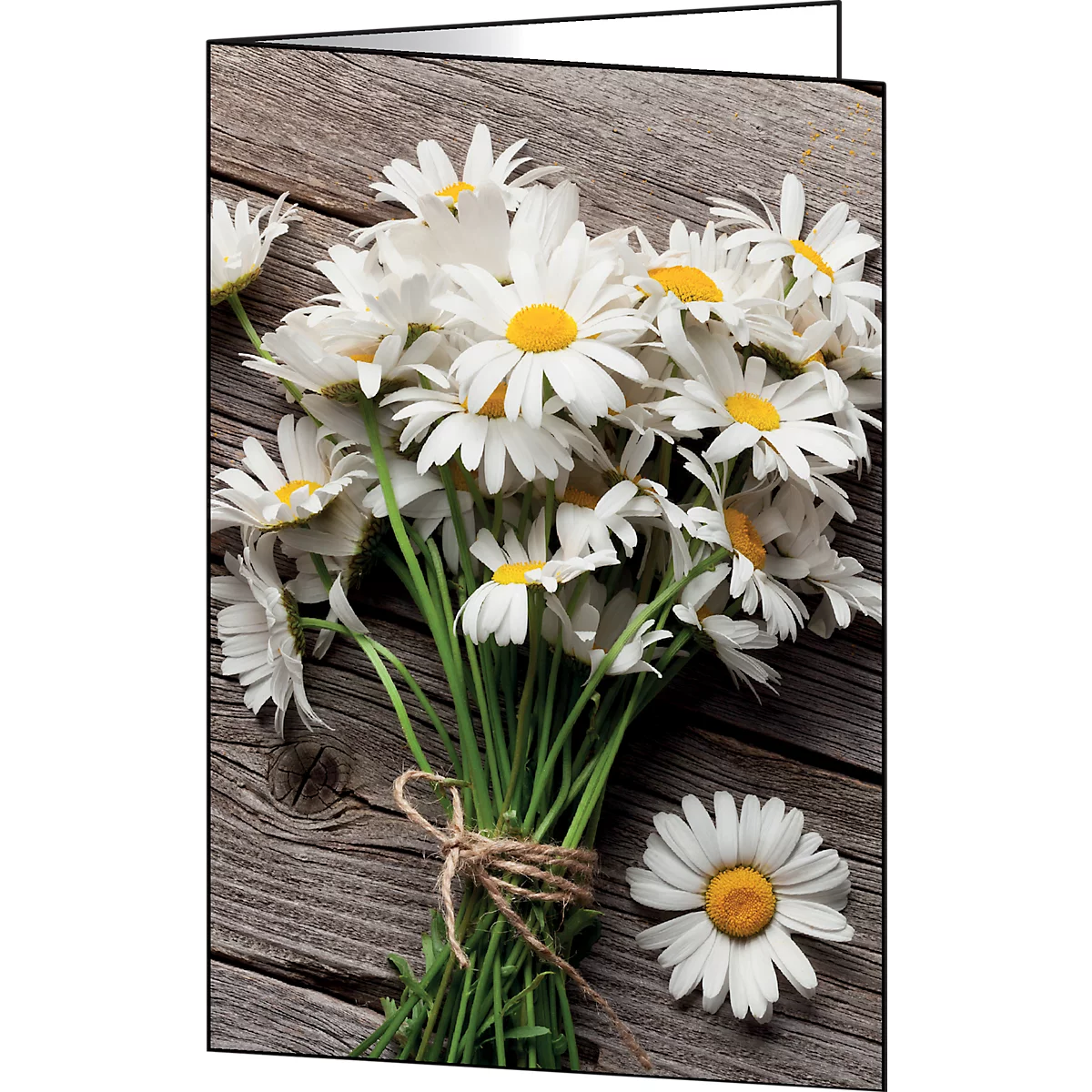 Close-up of a bouquet of white daisies with yellow centers, on a wooden background. One flower lies next to it.