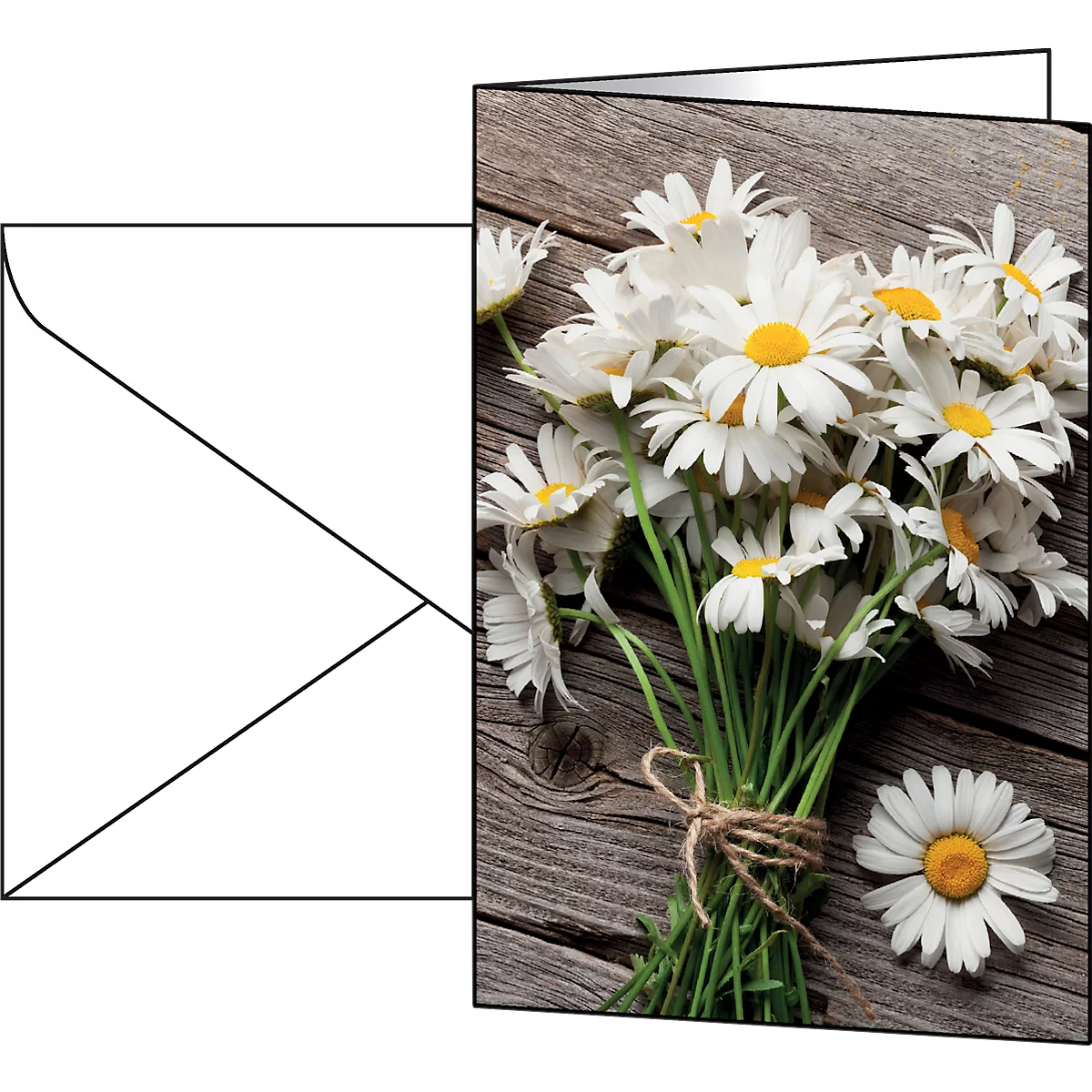 Bouquet of daisies on wood, greeting card and envelope next to it. Natural arrangement.