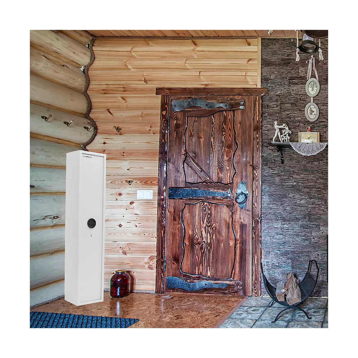 White gun safe in a wooden house. The door is made of dark wood, as is the wall behind it. On the floor stands a red vase.