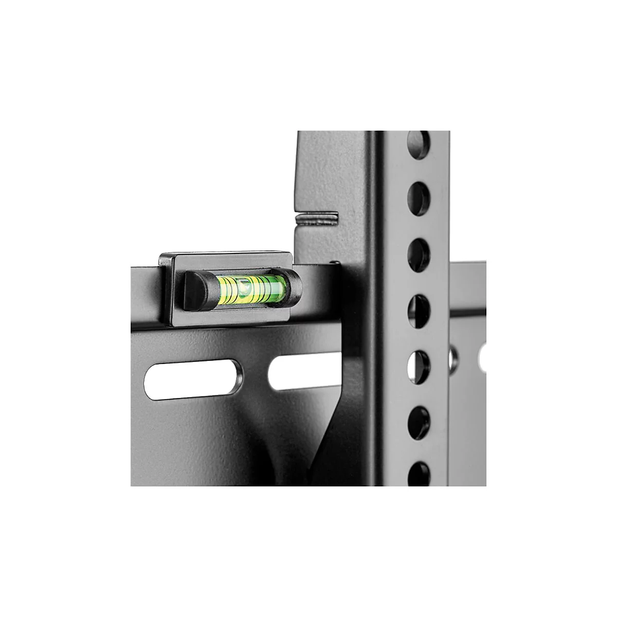 Nahaufnahme eines schwarzen Metallteils mit einer Wasserwaage. Die Libelle ist grün und gelb.