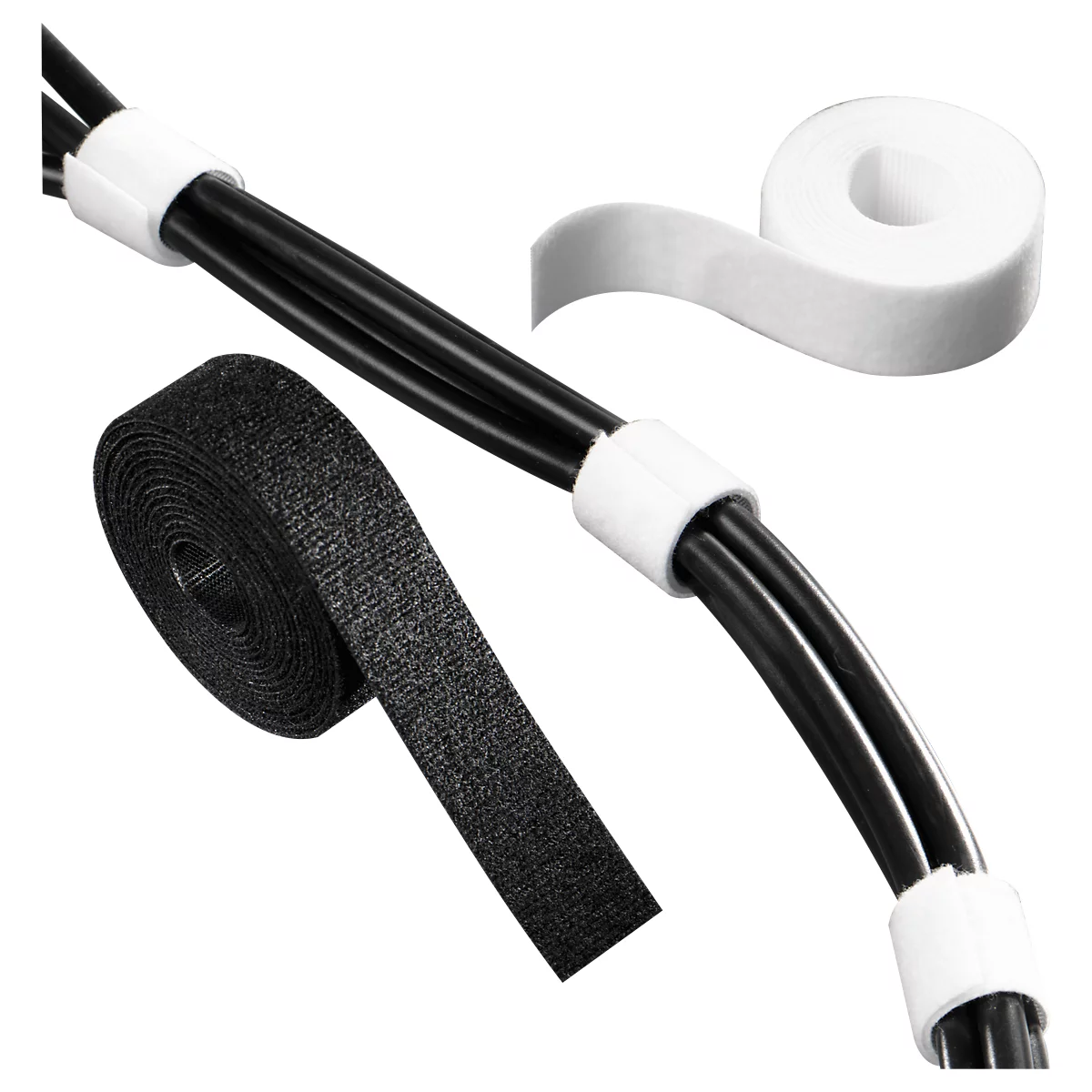 Black cables with white cable ties. Next to it Velcro roll and adhesive tape roll.