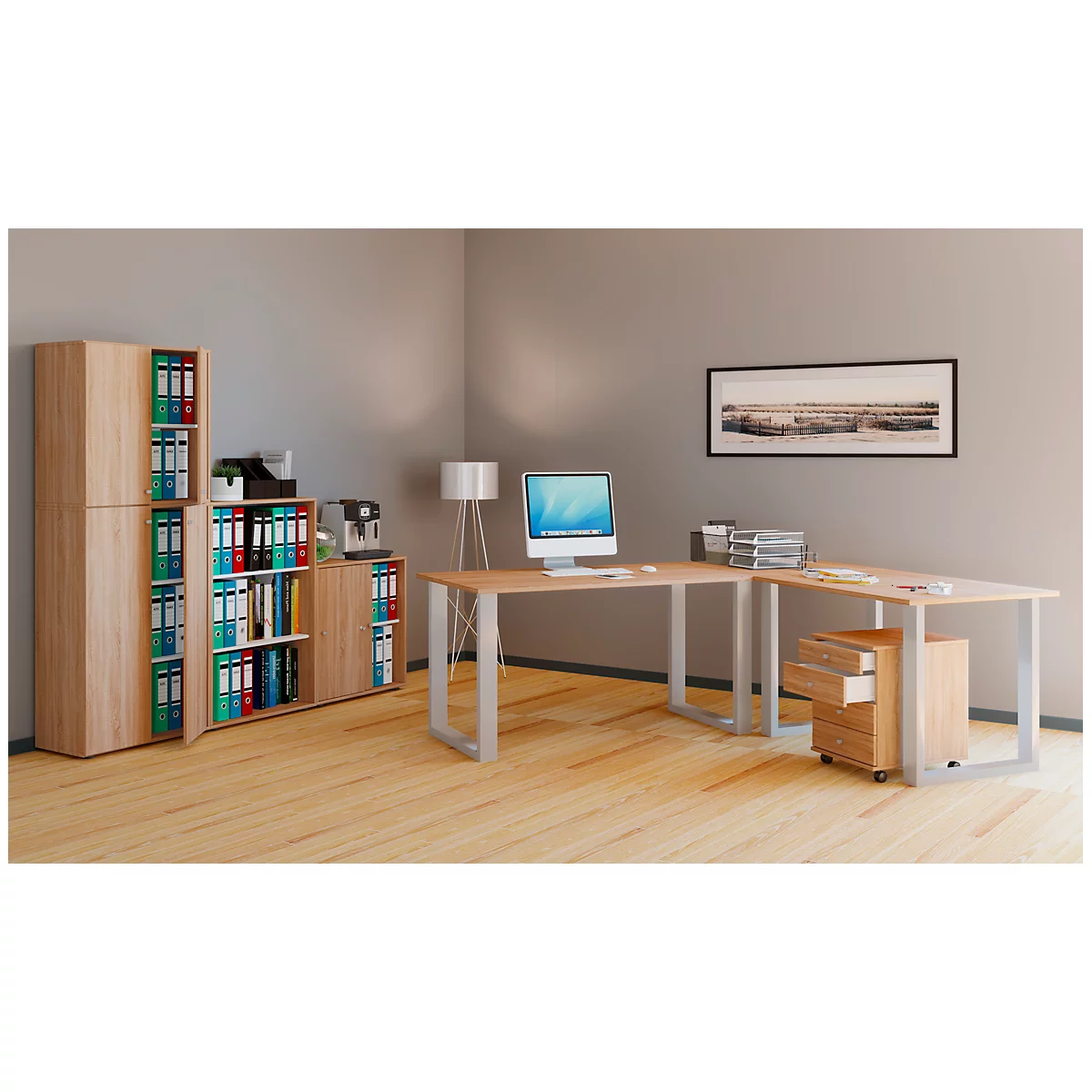 A modern office with a light wood desk, shelves and file cabinets. On the desk are a computer and office supplies.