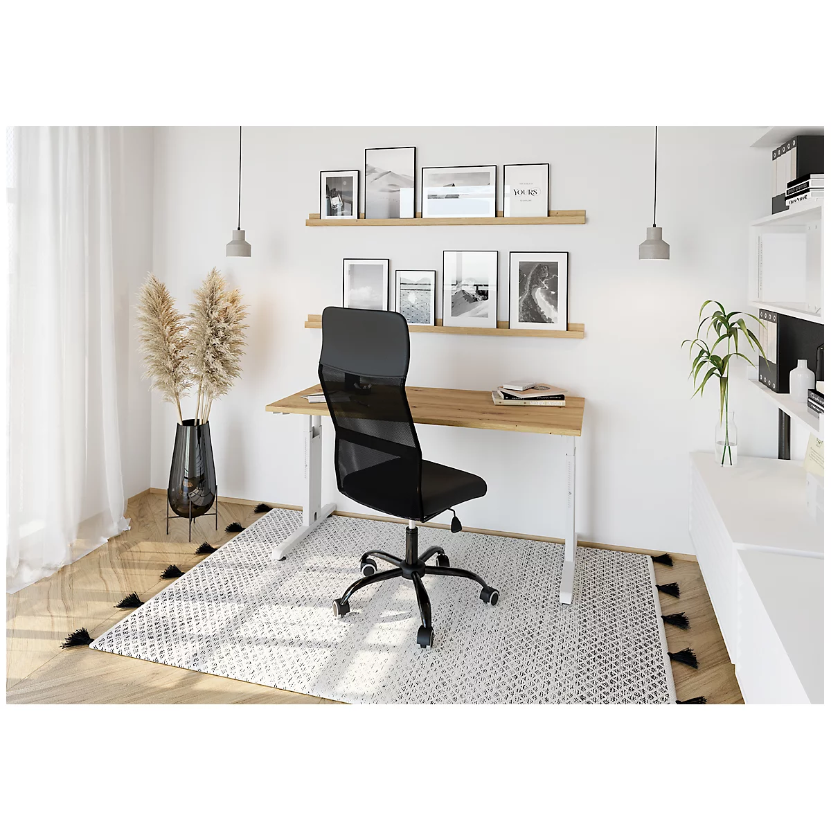 Office with desk, chair, shelves and decoration. The chair is black, the walls are white.