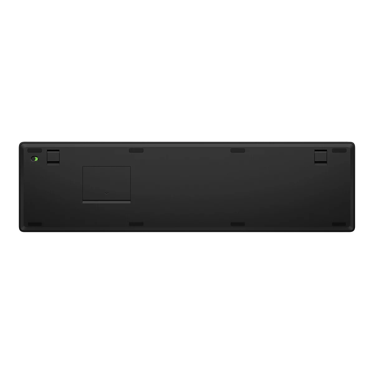Schwarze Tastatur-Rückseite, grüne LED-Anzeige, Akkufach, mehrere Aussparungen.