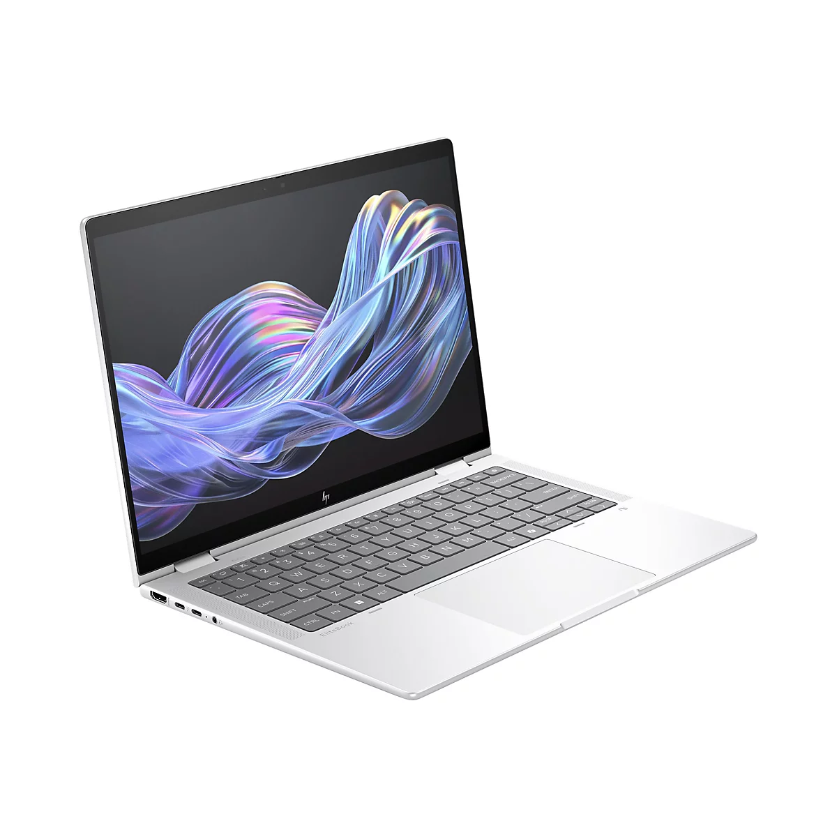Ein silbernes Laptop mit geöffnetem Bildschirm. Auf dem Bildschirm werden blau-violette Wirbellinien gezeigt. Die Tastatur ist hellgrau.