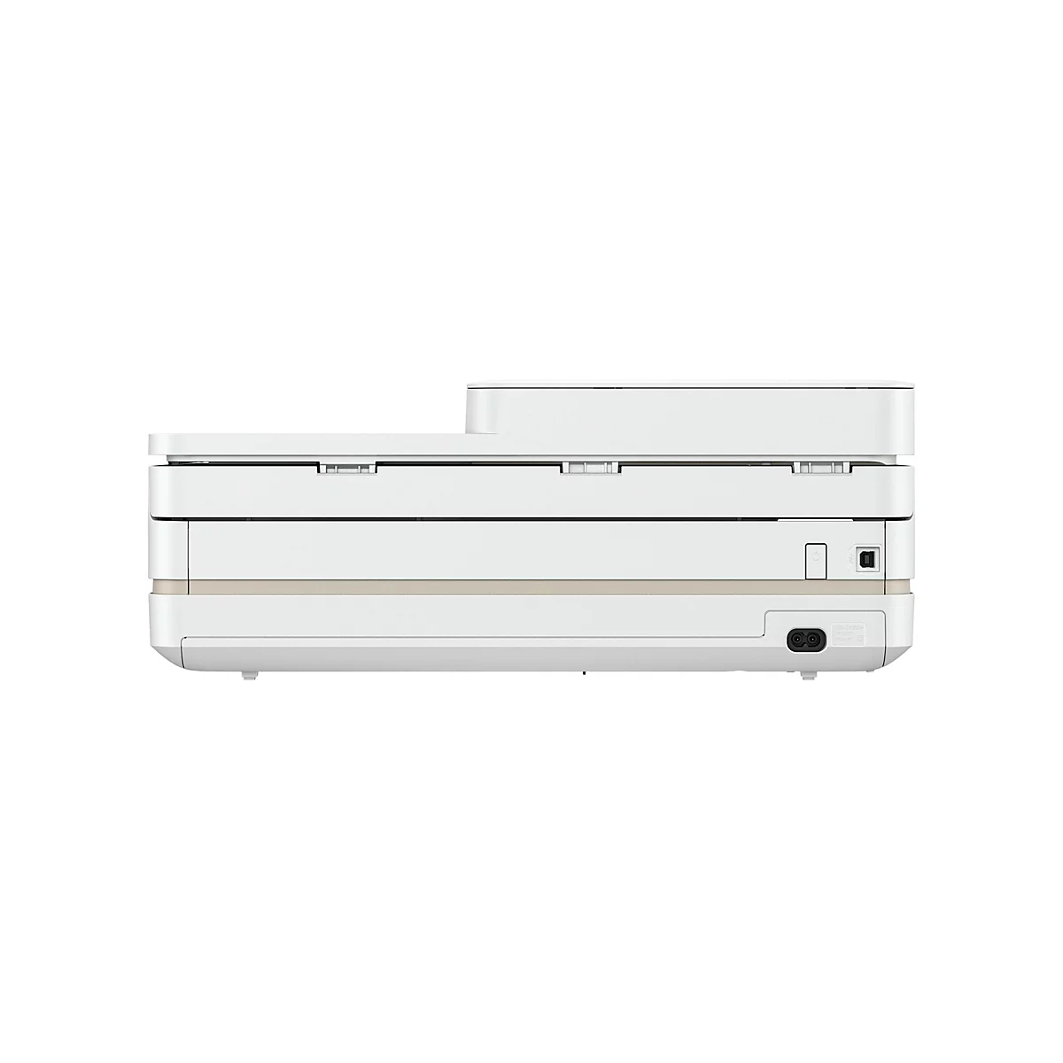 Seitenansicht eines cremefarbenen Druckers. Rechts befinden sich ein Stromanschluss und weitere Anschlüsse.