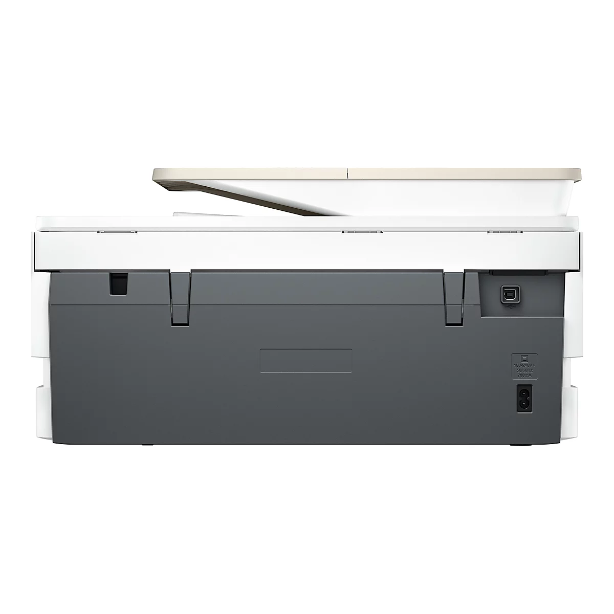 Vue arrière d'une imprimante, principalement blanche et grise, avec des connexions pour l'alimentation et l'USB.