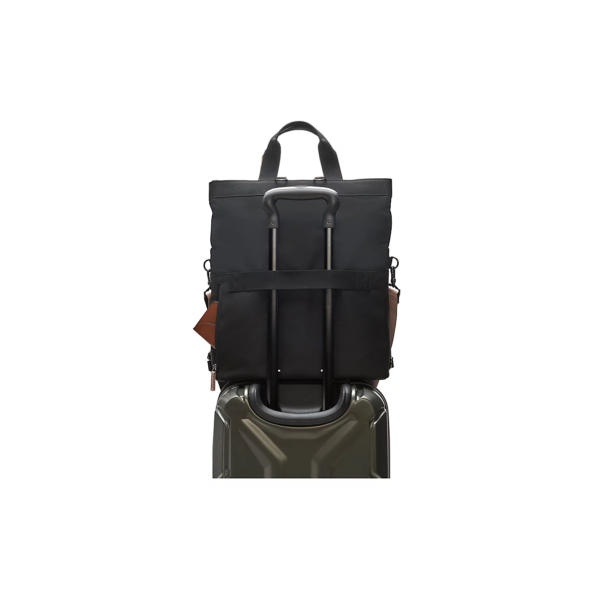 Schwarze Tragetasche auf einem olivgrünen Koffer mit ausziehbarem Griff. Ein braunes Portemonnaie steckt in der Tasche.