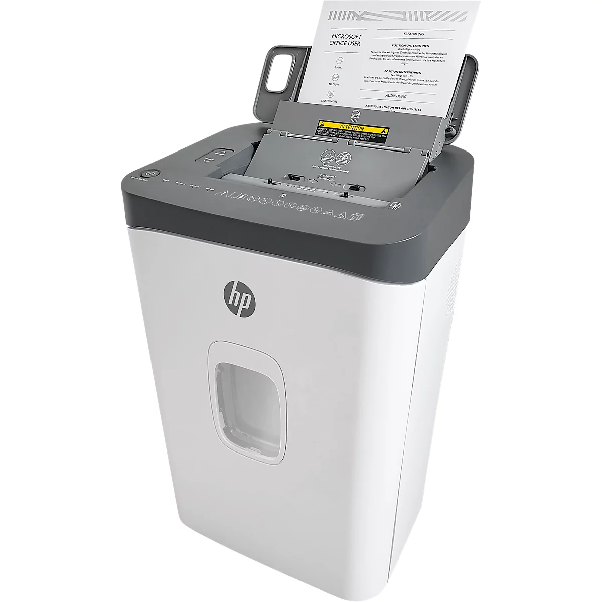 A white and gray HP paper shredder. Paper is being fed into the shredder. Details of the machine are clearly visible.