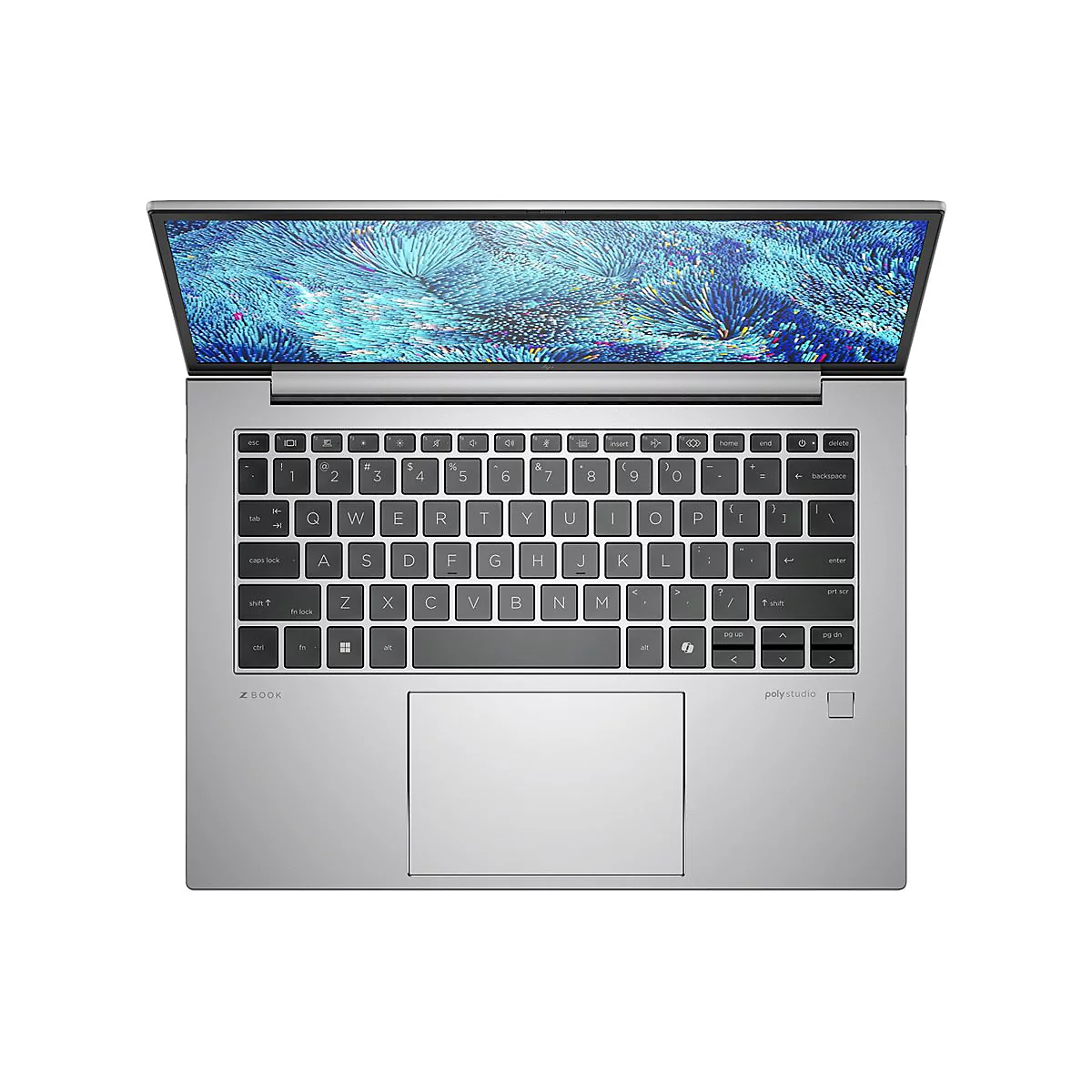 Draufsicht auf ein geöffnetes silbernes Laptop mit Tastatur und Touchpad. Der Bildschirm zeigt eine abstrakte blaue Grafik.