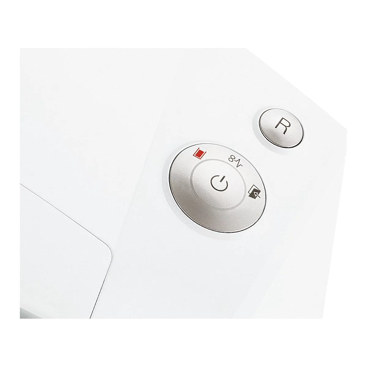 Close-up of white controls: a round power button, next to a button with "R". Detail shot.