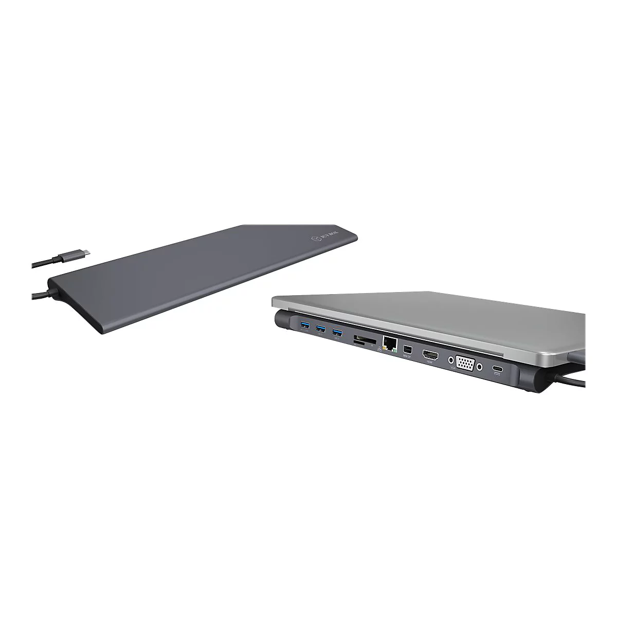 Graue Laptop-Dockingstation mit mehreren AnschlÃ¼ssen, neben einem Laptop.