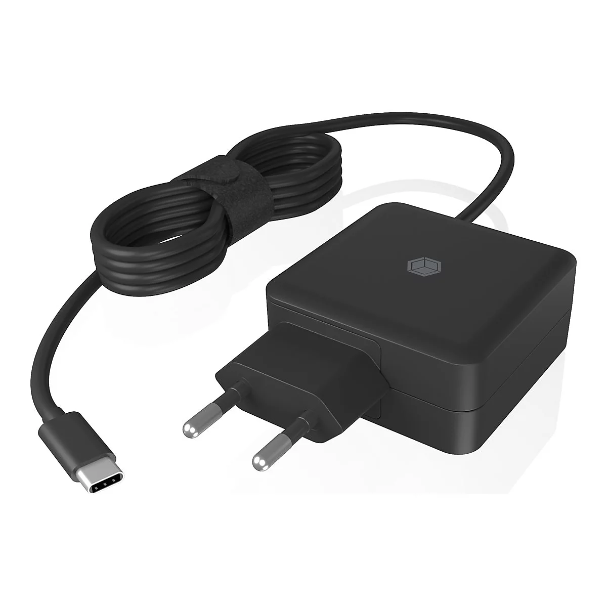 Schwarzes Ladegerät für Geräte mit USB-C-Anschluss. Das Kabel ist aufgerollt und mit Klettverschluss fixiert.